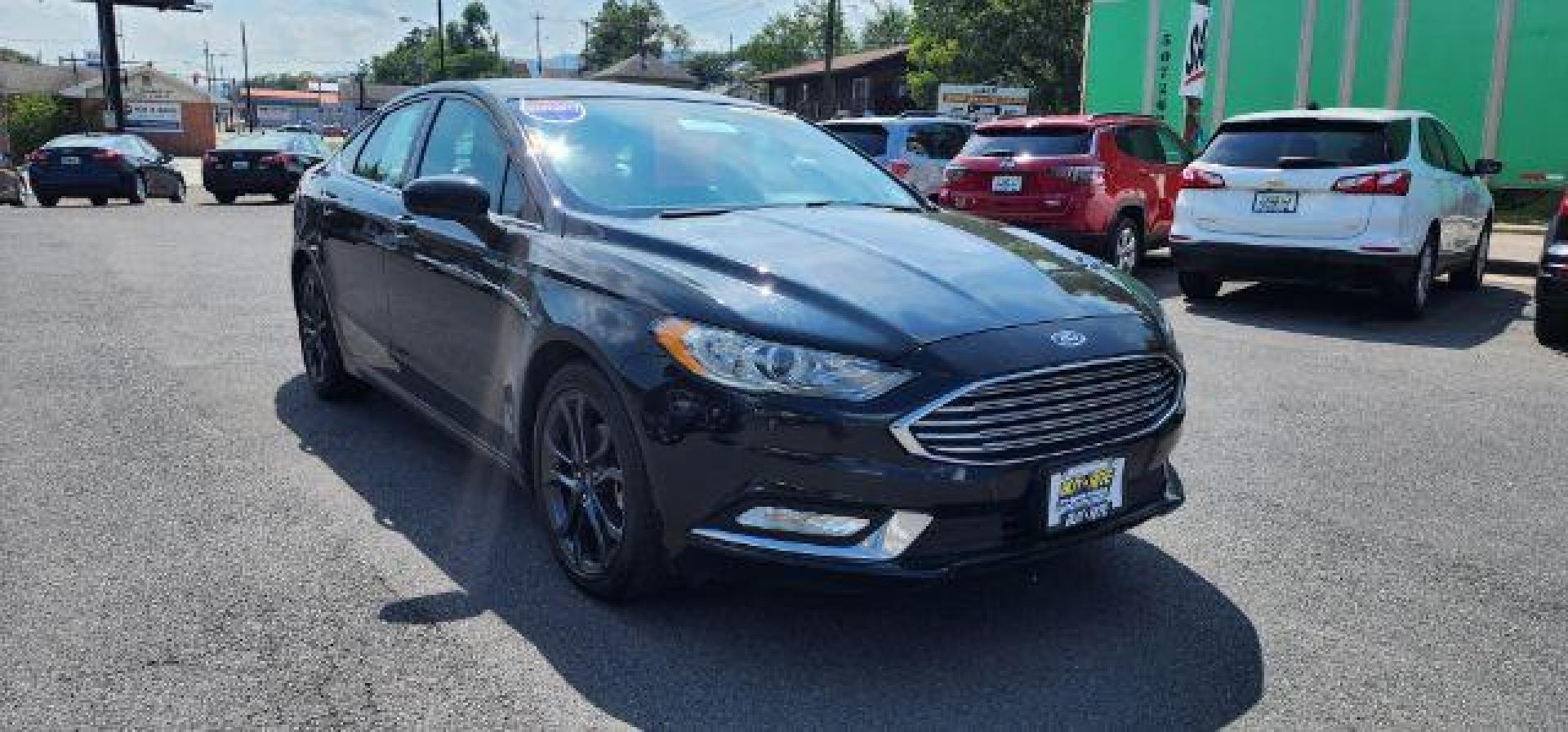 2018 BLACK /Ebony, leather Ford Fusion SE (3FA6P0H70JR) with an 2.5L L4 engine, AT transmission, located at 353 S. Mineral St., Keyser, WV, 26726, (304) 788-7887, 39.436451, -78.981674 - Photo#0