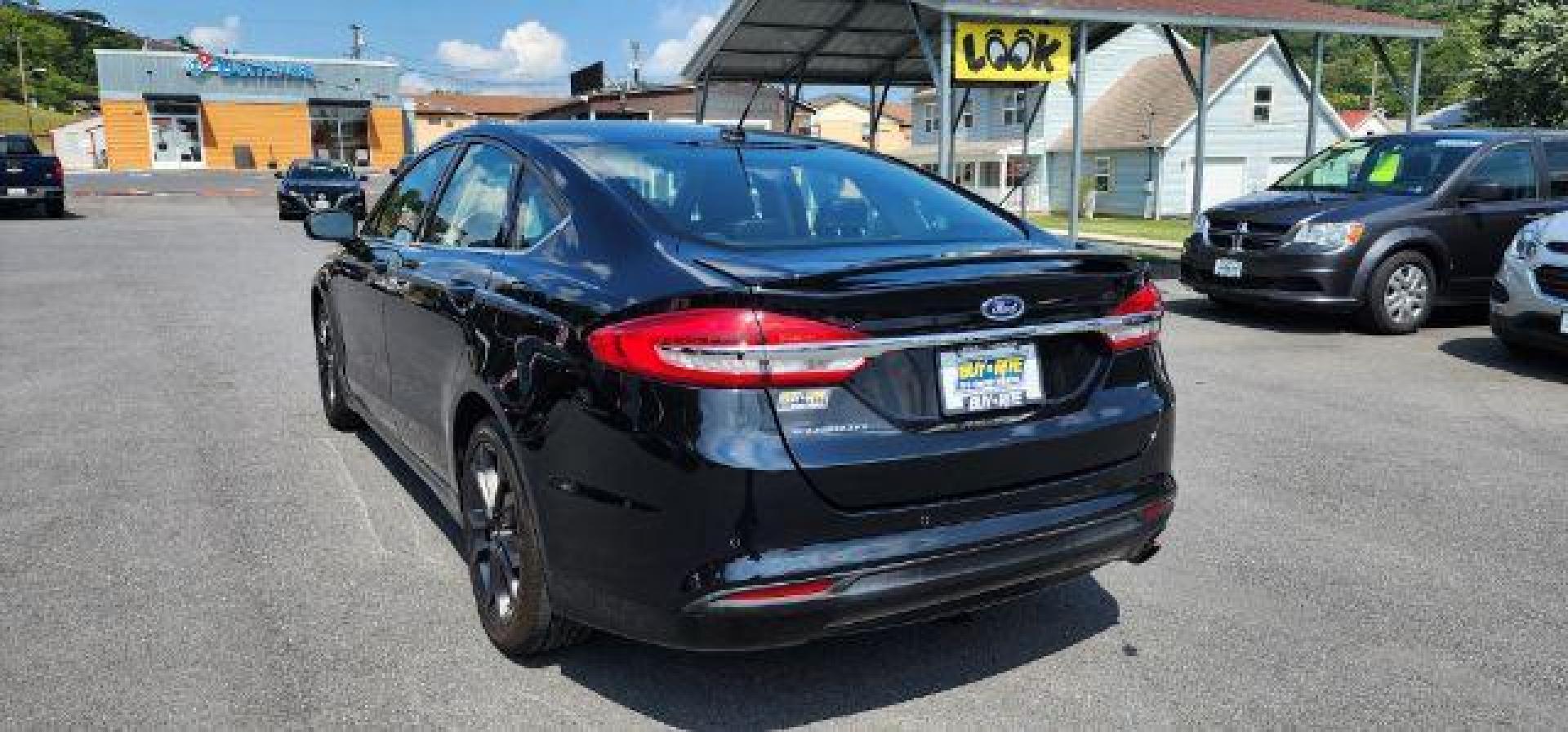 2018 BLACK /Ebony, leather Ford Fusion SE (3FA6P0H70JR) with an 2.5L L4 engine, AT transmission, located at 353 S. Mineral St., Keyser, WV, 26726, (304) 788-7887, 39.436451, -78.981674 - Photo#11