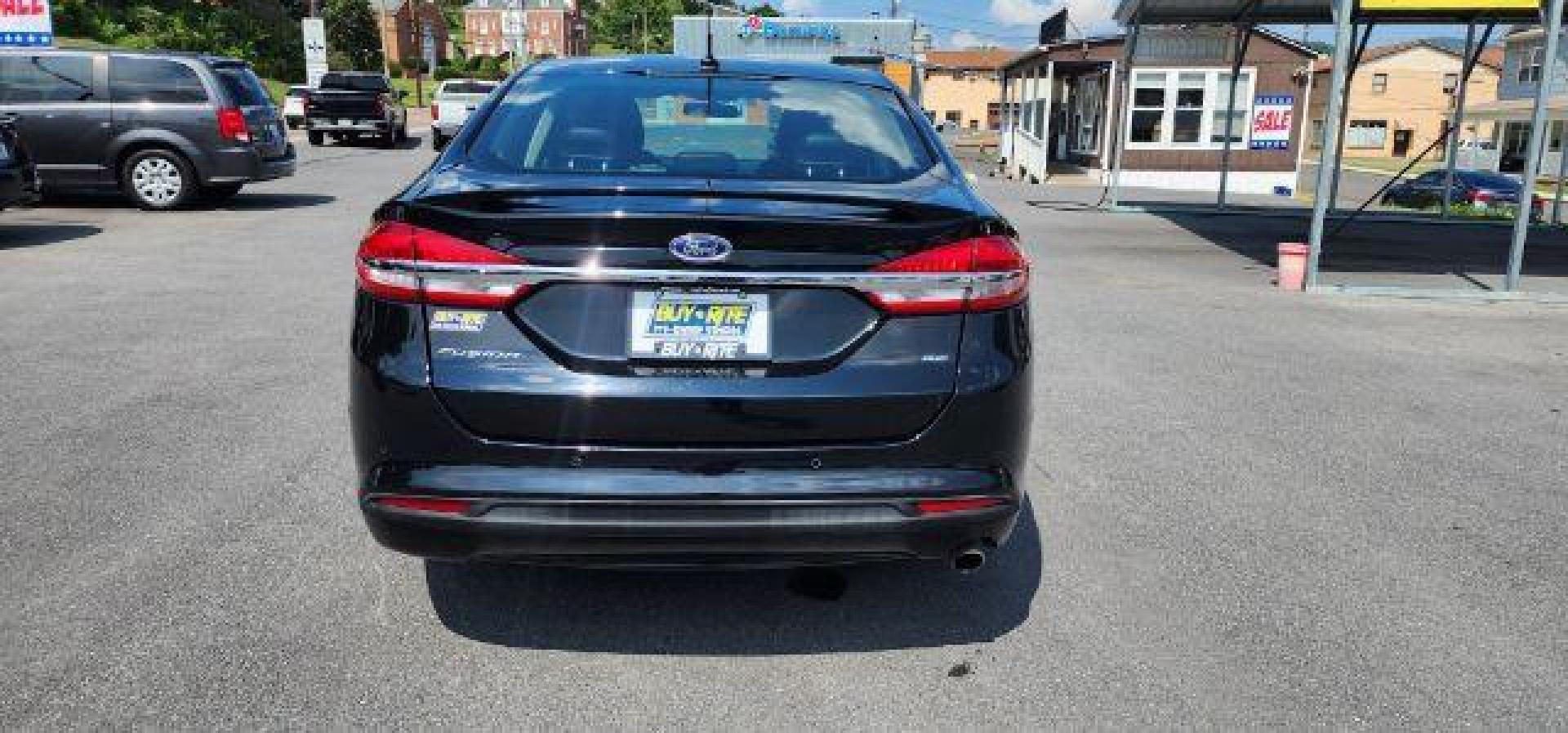 2018 BLACK /Ebony, leather Ford Fusion SE (3FA6P0H70JR) with an 2.5L L4 engine, AT transmission, located at 353 S. Mineral St., Keyser, WV, 26726, (304) 788-7887, 39.436451, -78.981674 - Photo#12