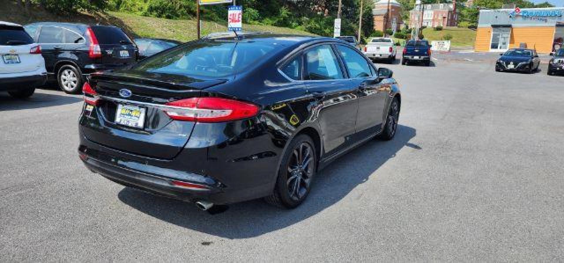 2018 BLACK /Ebony, leather Ford Fusion SE (3FA6P0H70JR) with an 2.5L L4 engine, AT transmission, located at 353 S. Mineral St., Keyser, WV, 26726, (304) 788-7887, 39.436451, -78.981674 - Photo#14