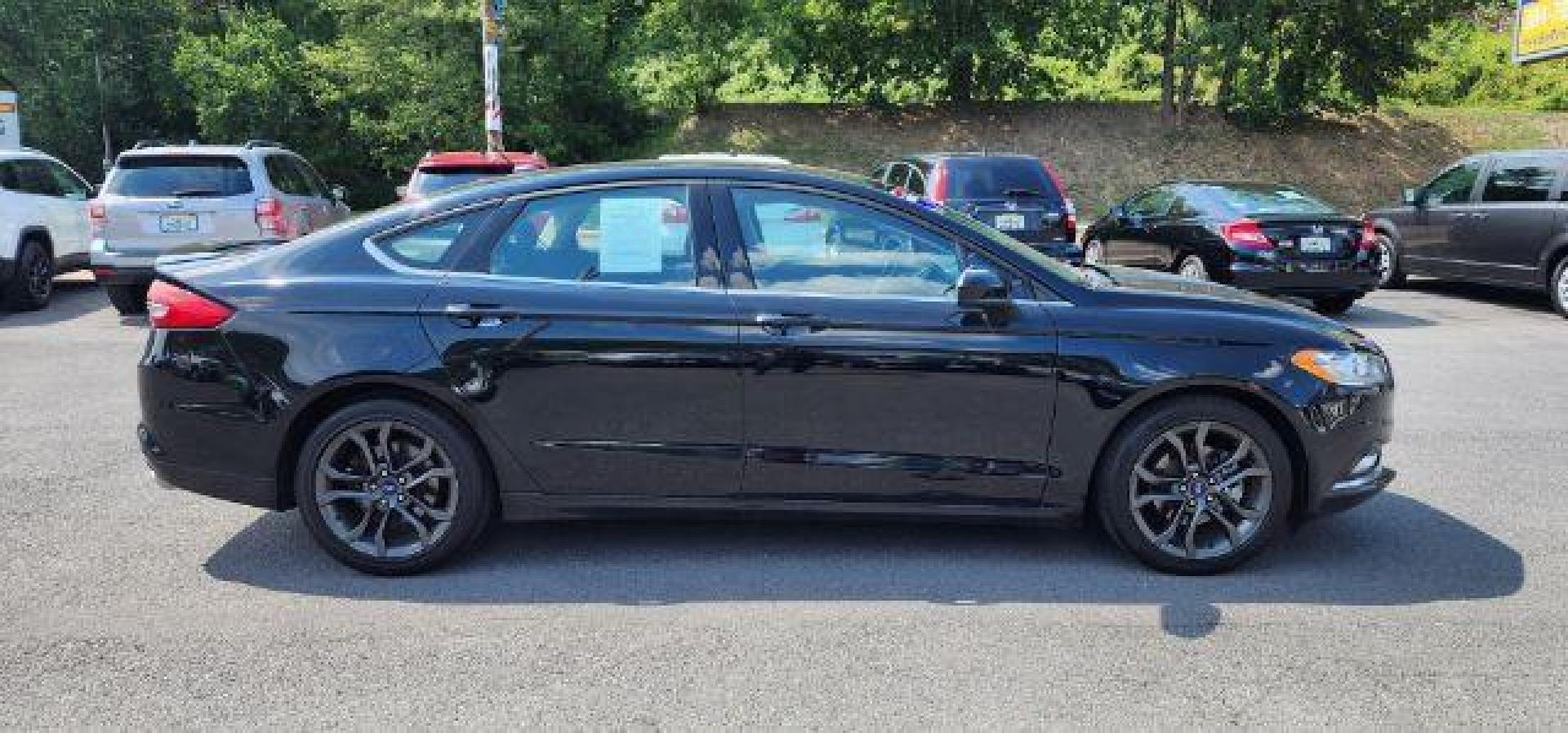 2018 BLACK /Ebony, leather Ford Fusion SE (3FA6P0H70JR) with an 2.5L L4 engine, AT transmission, located at 353 S. Mineral St., Keyser, WV, 26726, (304) 788-7887, 39.436451, -78.981674 - Photo#15