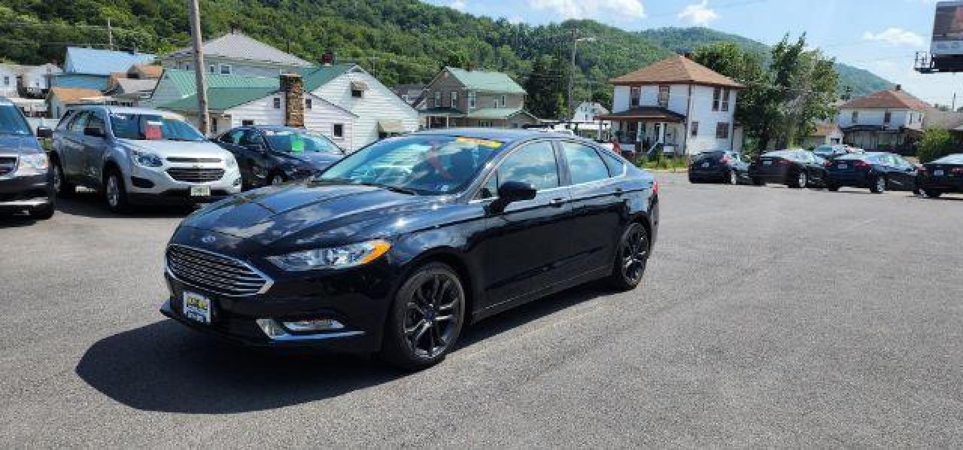 2018 BLACK /Ebony, leather Ford Fusion SE (3FA6P0H70JR) with an 2.5L L4 engine, AT transmission, located at 353 S. Mineral St., Keyser, WV, 26726, (304) 788-7887, 39.436451, -78.981674 - Photo#2