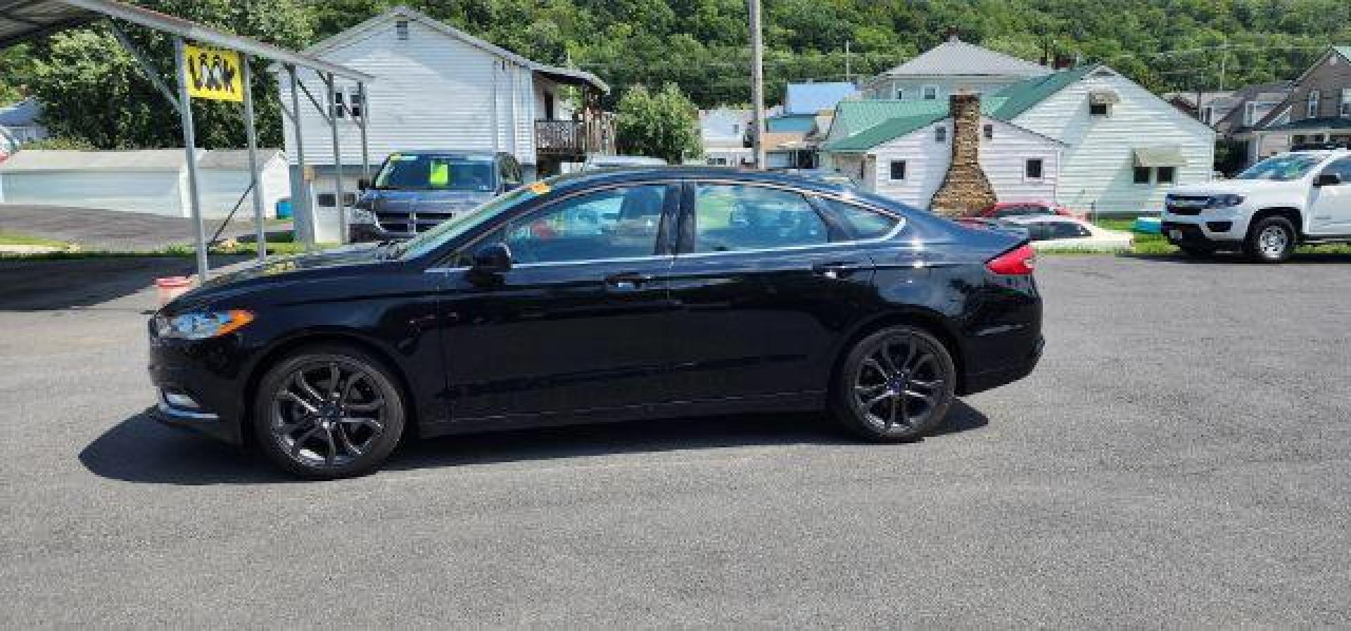 2018 BLACK /Ebony, leather Ford Fusion SE (3FA6P0H70JR) with an 2.5L L4 engine, AT transmission, located at 353 S. Mineral St., Keyser, WV, 26726, (304) 788-7887, 39.436451, -78.981674 - Photo#3