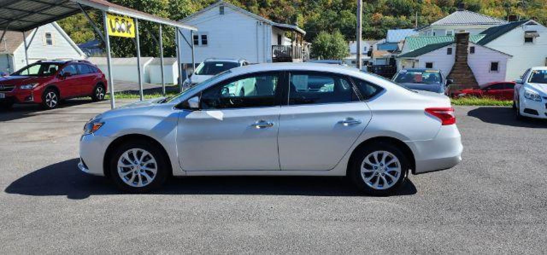 2019 SILVER /Charcoal, premium cloth Nissan Sentra SV (3N1AB7AP9KY) with an 1.8L L4 engine, CVT transmission, located at 353 S. Mineral St., Keyser, WV, 26726, (304) 788-7887, 39.436451, -78.981674 - Photo#3