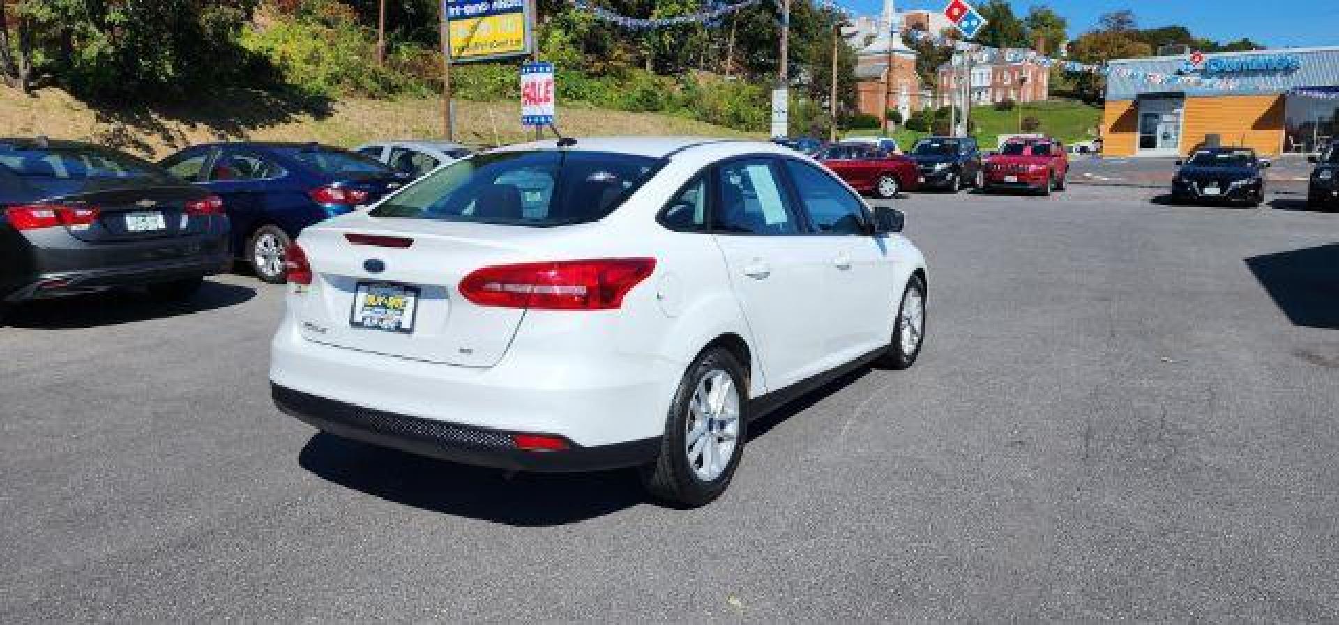 2018 WHITE /Charcoal Black Insert w/Warm Steel Surround, cloth Ford Focus SE Sedan (1FADP3F24JL) with an 2.0L L4 engine, AT transmission, located at 353 S. Mineral St., Keyser, WV, 26726, (304) 788-7887, 39.436451, -78.981674 - Photo#13