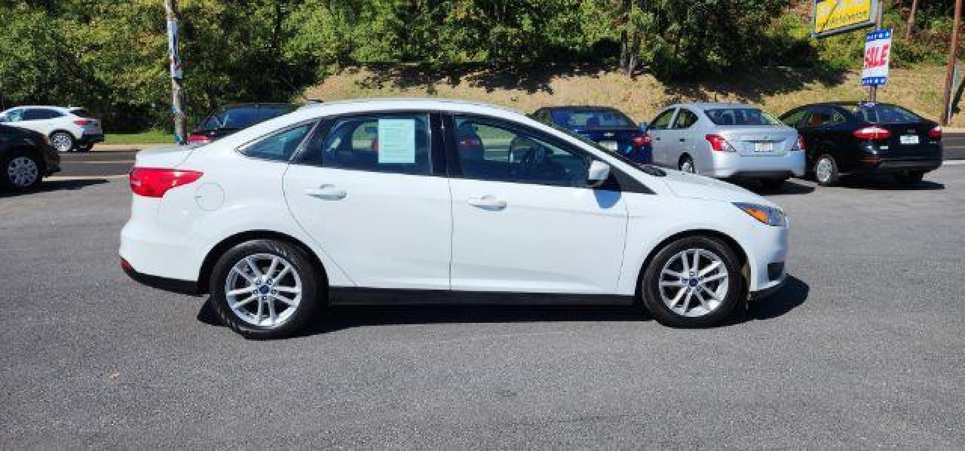 2018 WHITE /Charcoal Black Insert w/Warm Steel Surround, cloth Ford Focus SE Sedan (1FADP3F24JL) with an 2.0L L4 engine, AT transmission, located at 353 S. Mineral St., Keyser, WV, 26726, (304) 788-7887, 39.436451, -78.981674 - Photo#14