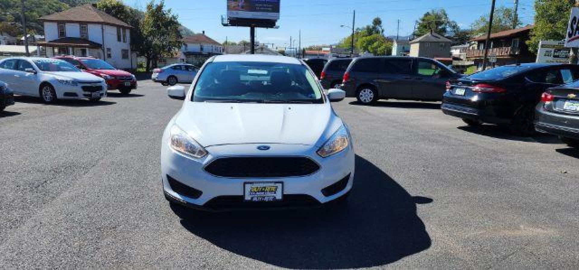 2018 WHITE /Charcoal Black Insert w/Warm Steel Surround, cloth Ford Focus SE Sedan (1FADP3F24JL) with an 2.0L L4 engine, AT transmission, located at 353 S. Mineral St., Keyser, WV, 26726, (304) 788-7887, 39.436451, -78.981674 - Photo#1