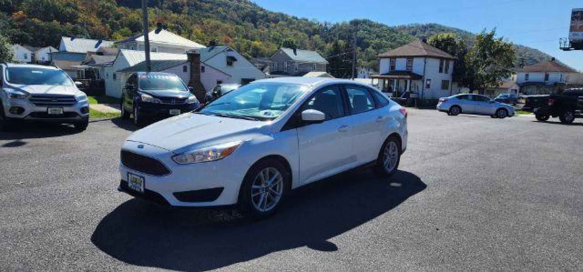 2018 WHITE /Charcoal Black Insert w/Warm Steel Surround, cloth Ford Focus SE Sedan (1FADP3F24JL) with an 2.0L L4 engine, AT transmission, located at 353 S. Mineral St., Keyser, WV, 26726, (304) 788-7887, 39.436451, -78.981674 - Photo#2