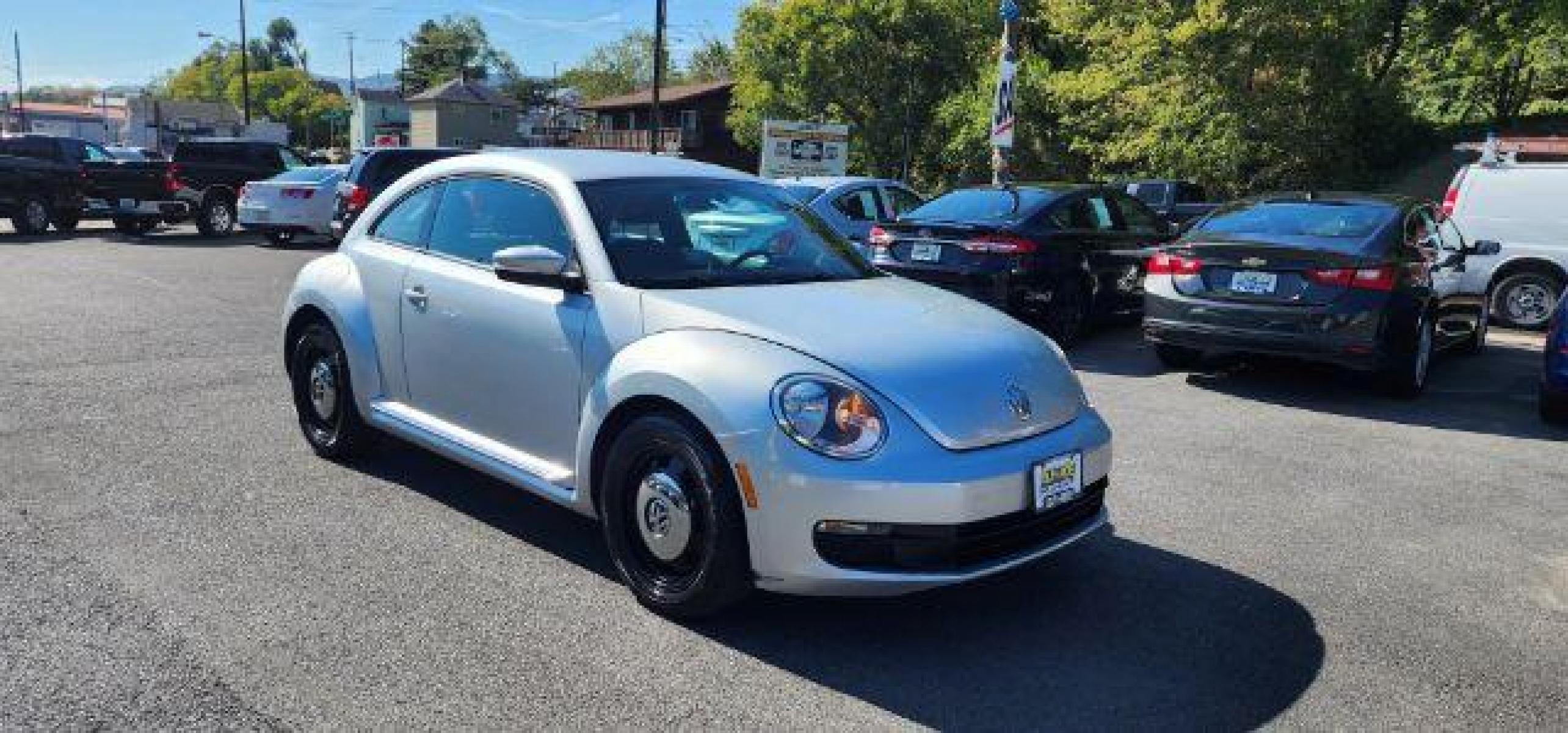 2012 SILVER /Leather Black Volkswagen Beetle Base (3VWHP7AT6CM) with an 2.5 L4 engine, 5SP transmission, located at 353 S. Mineral St., Keyser, WV, 26726, (304) 788-7887, 39.436451, -78.981674 - FOR A BETTER PRICE CALL PAUL AT 301-268-8150 - Photo #0