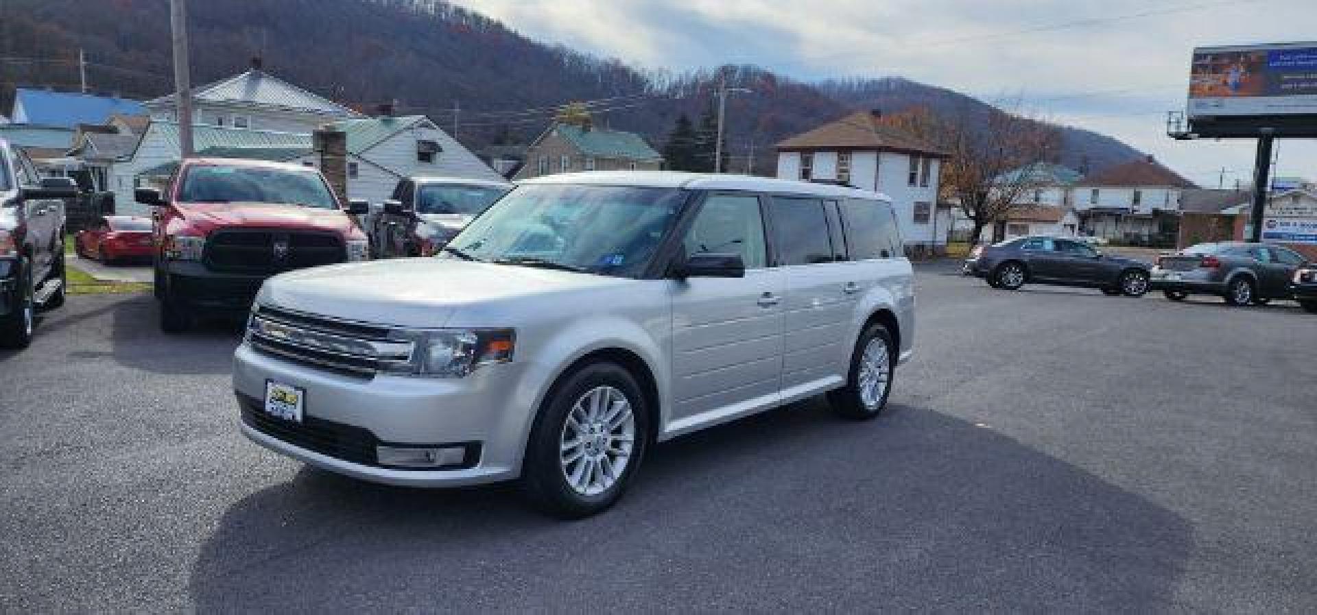 2014 SILVER /Charcoal Black Ford Flex SEL AWD (2FMHK6C84EB) with an 3.5L V6 engine, AT transmission, located at 353 S. Mineral St., Keyser, WV, 26726, (304) 788-7887, 39.436451, -78.981674 - Photo#0