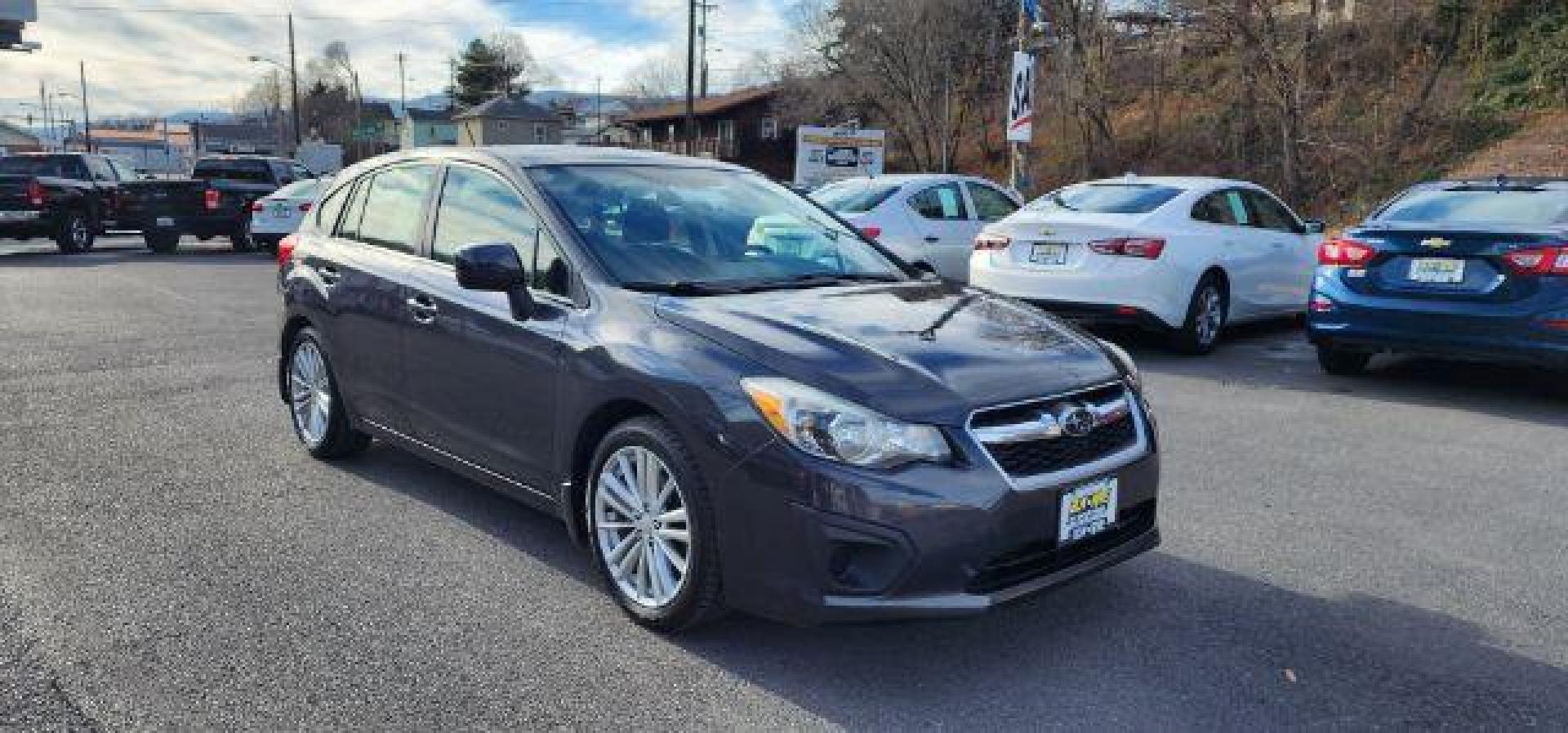 2012 GRAY /Black Cloth Interior Subaru Impreza Premium Plus 5-Door+S/R (JF1GPAD6XCH) with an 2.0L L4 engine, CVT transmission, located at 353 S. Mineral St., Keyser, WV, 26726, (304) 788-7887, 39.436451, -78.981674 - Photo#0