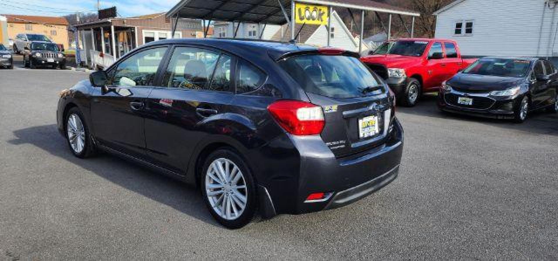 2012 GRAY /Black Cloth Interior Subaru Impreza Premium Plus 5-Door+S/R (JF1GPAD6XCH) with an 2.0L L4 engine, CVT transmission, located at 353 S. Mineral St., Keyser, WV, 26726, (304) 788-7887, 39.436451, -78.981674 - Photo#11