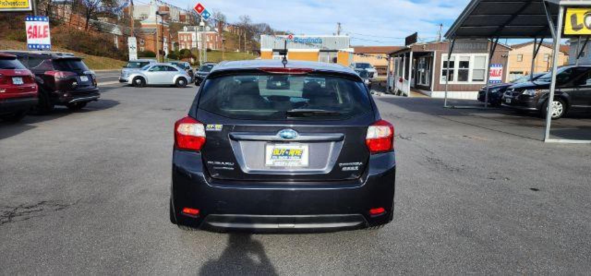 2012 GRAY /Black Cloth Interior Subaru Impreza Premium Plus 5-Door+S/R (JF1GPAD6XCH) with an 2.0L L4 engine, CVT transmission, located at 353 S. Mineral St., Keyser, WV, 26726, (304) 788-7887, 39.436451, -78.981674 - Photo#12