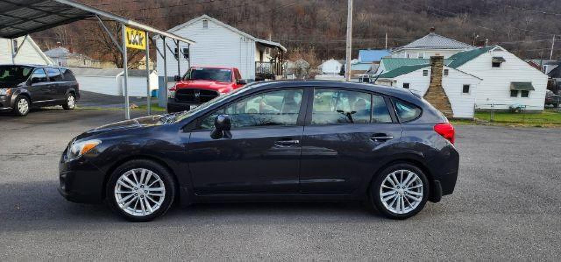 2012 GRAY /Black Cloth Interior Subaru Impreza Premium Plus 5-Door+S/R (JF1GPAD6XCH) with an 2.0L L4 engine, CVT transmission, located at 353 S. Mineral St., Keyser, WV, 26726, (304) 788-7887, 39.436451, -78.981674 - Photo#3