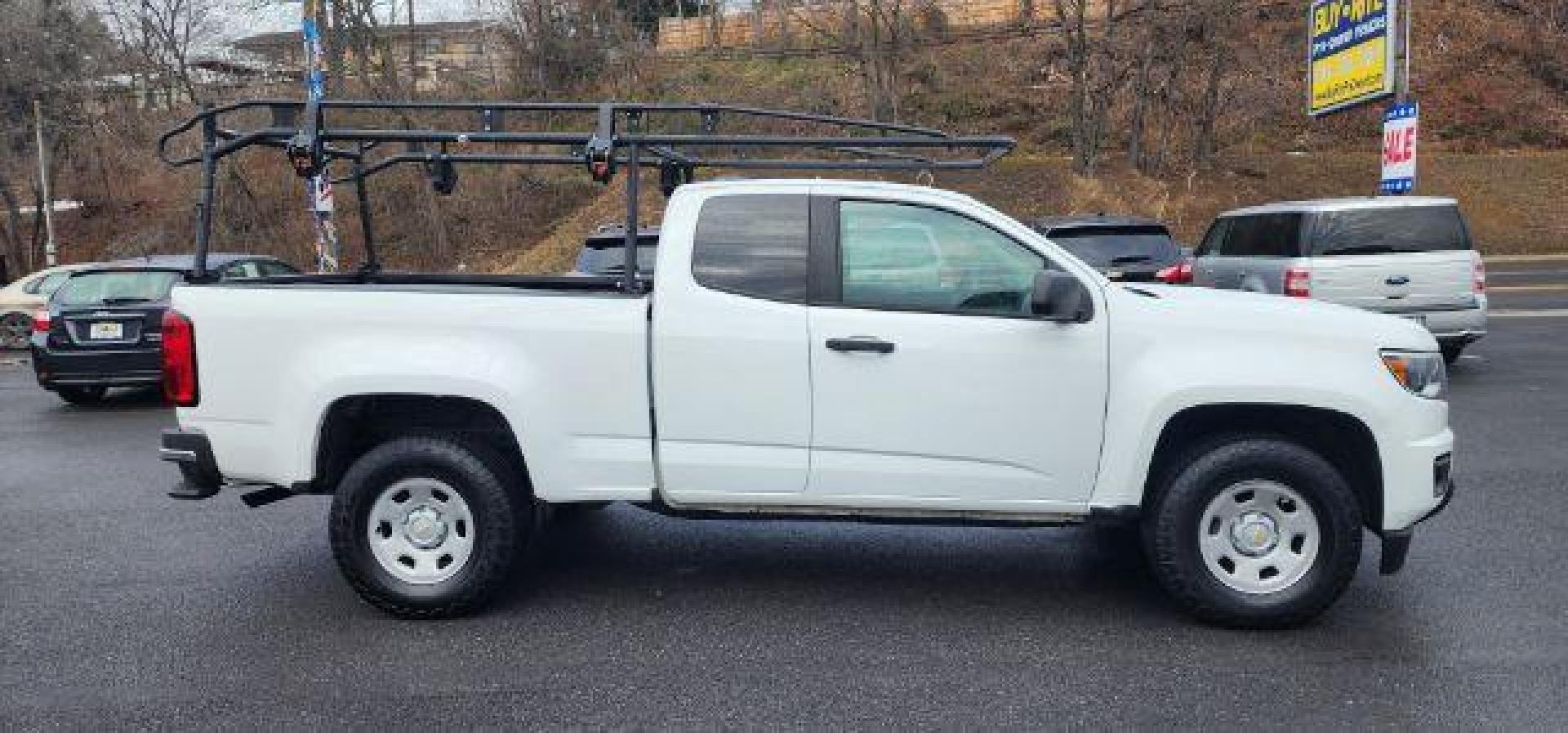 2019 WHITE /Jet Black/Dark Ash, vinyl Chevrolet Colorado Work Truck Ext. Cab 4WD (1GCHTBEAXK1) with an 2.5 L4 engine, AT transmission, located at 353 S. Mineral St., Keyser, WV, 26726, (304) 788-7887, 39.436451, -78.981674 - Photo#11