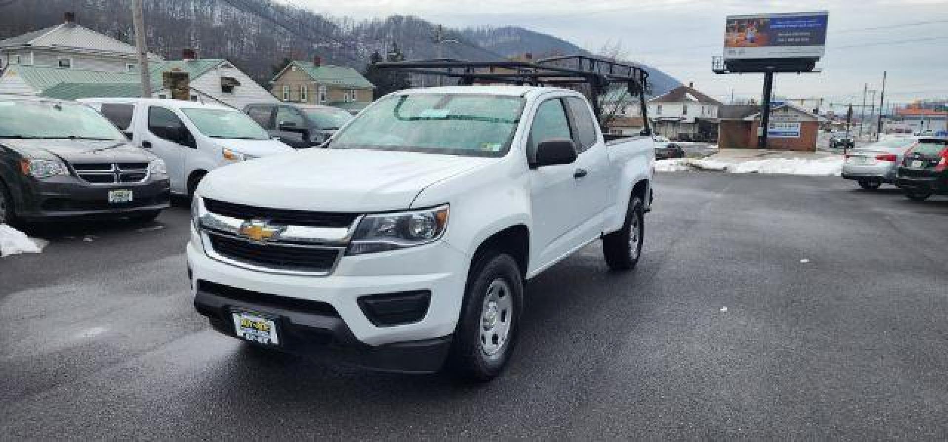 2019 WHITE /Jet Black/Dark Ash, vinyl Chevrolet Colorado Work Truck Ext. Cab 4WD (1GCHTBEAXK1) with an 2.5 L4 engine, AT transmission, located at 353 S. Mineral St., Keyser, WV, 26726, (304) 788-7887, 39.436451, -78.981674 - Photo#1