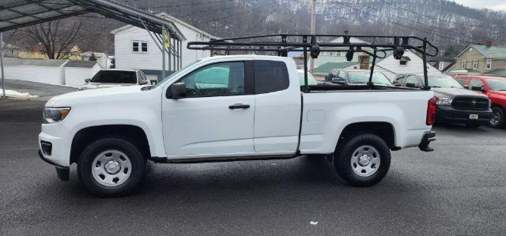 2019 WHITE /Jet Black/Dark Ash, vinyl Chevrolet Colorado Work Truck Ext. Cab 4WD (1GCHTBEAXK1) with an 2.5 L4 engine, AT transmission, located at 353 S. Mineral St., Keyser, WV, 26726, (304) 788-7887, 39.436451, -78.981674 - Photo#2