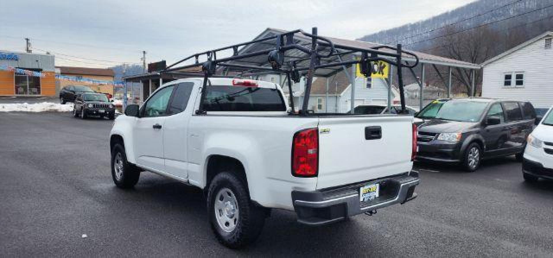 2019 WHITE /Jet Black/Dark Ash, vinyl Chevrolet Colorado Work Truck Ext. Cab 4WD (1GCHTBEAXK1) with an 2.5 L4 engine, AT transmission, located at 353 S. Mineral St., Keyser, WV, 26726, (304) 788-7887, 39.436451, -78.981674 - Photo#7