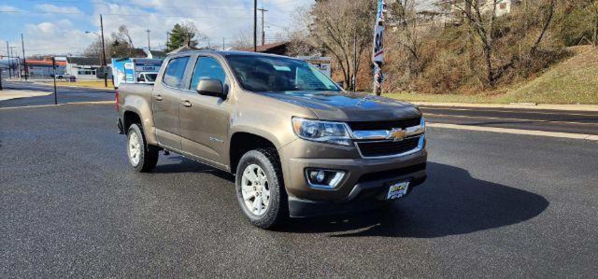 2015 BROWN /Jet Black Chevrolet Colorado LT Crew Cab 4WD Short Box (1GCGTBE37F1) with an 3.6L V6 engine, AT transmission, located at 353 S. Mineral St., Keyser, WV, 26726, (304) 788-7887, 39.436451, -78.981674 - Photo#0