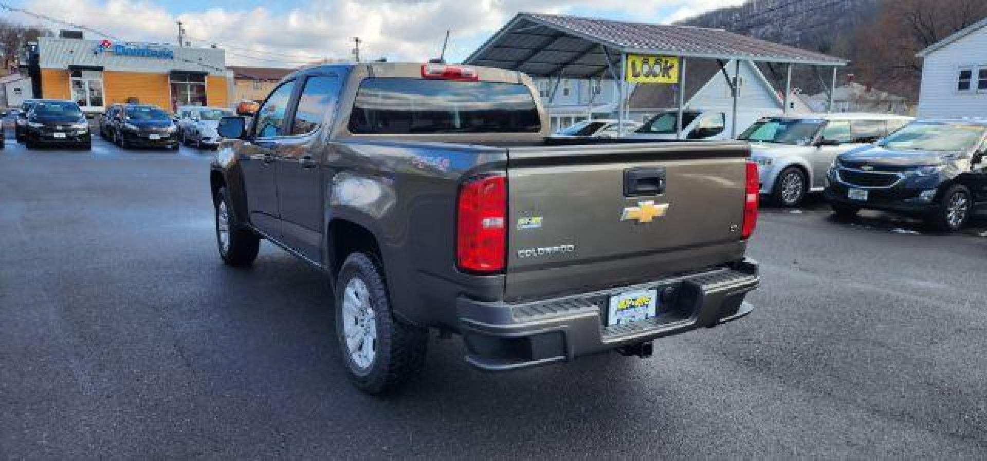 2015 BROWN /Jet Black Chevrolet Colorado LT Crew Cab 4WD Short Box (1GCGTBE37F1) with an 3.6L V6 engine, AT transmission, located at 353 S. Mineral St., Keyser, WV, 26726, (304) 788-7887, 39.436451, -78.981674 - Photo#14