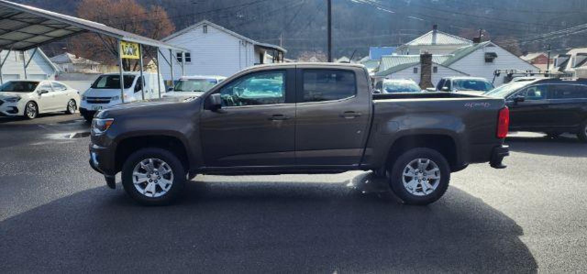 2015 BROWN /Jet Black Chevrolet Colorado LT Crew Cab 4WD Short Box (1GCGTBE37F1) with an 3.6L V6 engine, AT transmission, located at 353 S. Mineral St., Keyser, WV, 26726, (304) 788-7887, 39.436451, -78.981674 - Photo#2