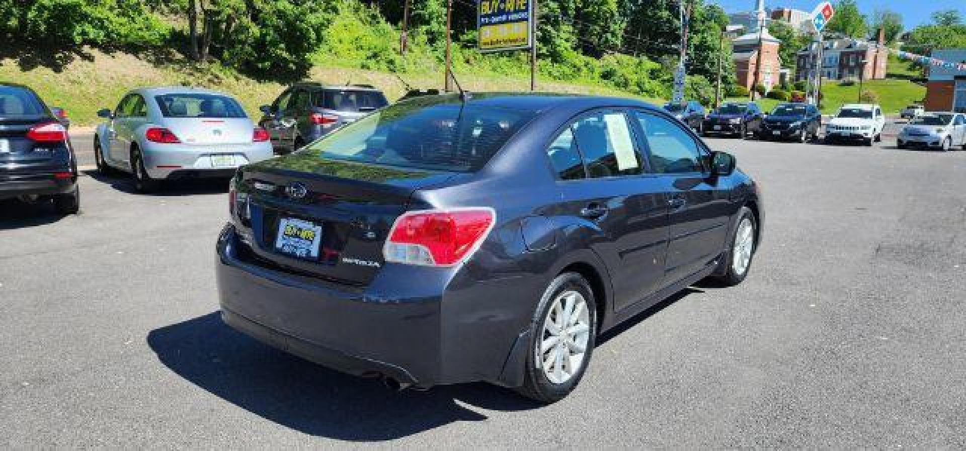 2014 GRAY /Black Subaru Impreza 2.0i Premium 4-Door w/All Weather Package (JF1GJAC68EH) with an 2.0L L4 engine, CVT transmission, located at 353 S. Mineral St., Keyser, WV, 26726, (304) 788-7887, 39.436451, -78.981674 - Photo#12