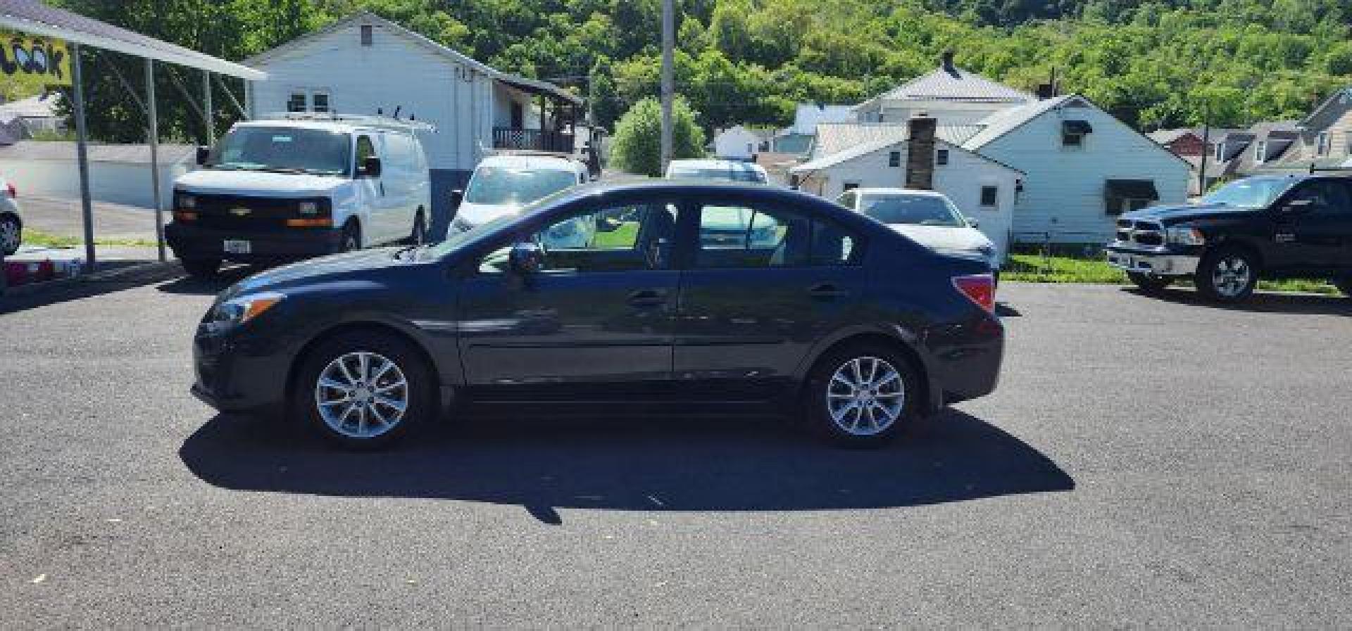 2014 GRAY /Black Subaru Impreza 2.0i Premium 4-Door w/All Weather Package (JF1GJAC68EH) with an 2.0L L4 engine, CVT transmission, located at 353 S. Mineral St., Keyser, WV, 26726, (304) 788-7887, 39.436451, -78.981674 - Photo#3