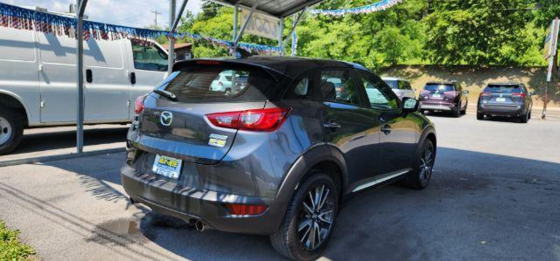 2016 Gray Mazda CX-3 SUV (JM1DKBD7XG0) with an 2.0l L4 engine, AT transmission, located at 353 S. Mineral St., Keyser, WV, 26726, (304) 788-7887, 39.436451, -78.981674 - Photo#11