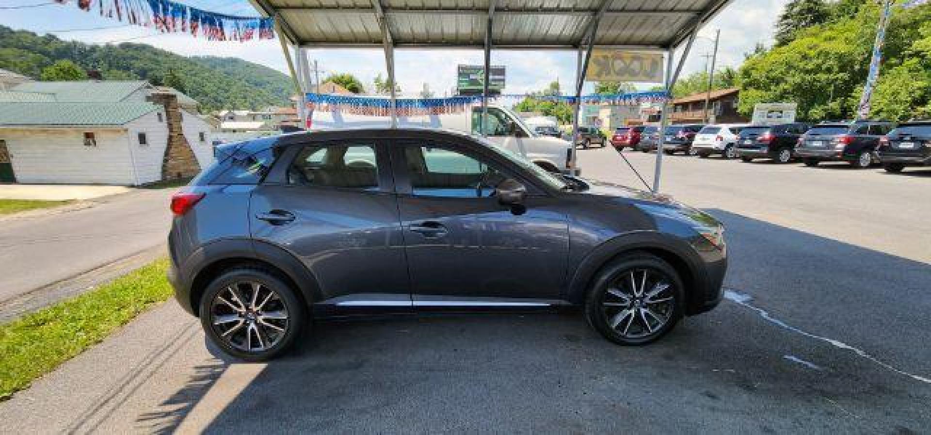 2016 Gray Mazda CX-3 SUV (JM1DKBD7XG0) with an 2.0l L4 engine, AT transmission, located at 353 S. Mineral St., Keyser, WV, 26726, (304) 788-7887, 39.436451, -78.981674 - Photo#12