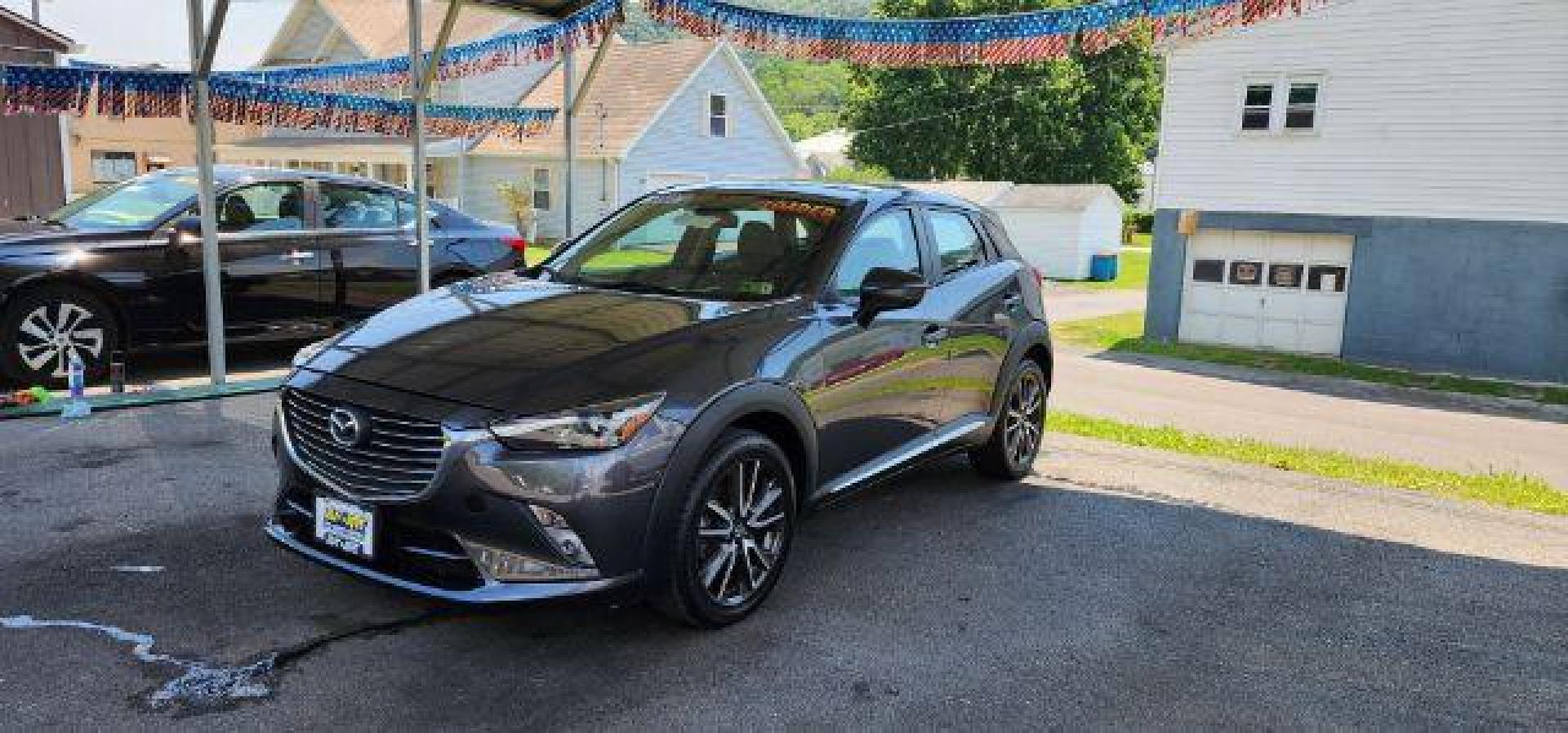 2016 Gray Mazda CX-3 SUV (JM1DKBD7XG0) with an 2.0l L4 engine, AT transmission, located at 353 S. Mineral St., Keyser, WV, 26726, (304) 788-7887, 39.436451, -78.981674 - Photo#2