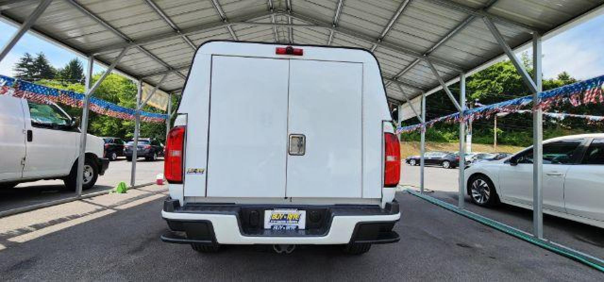 2017 WHITE /Jet Black/Dark Ash, cloth Chevrolet Colorado Work Truck Ext. Cab 4WD (1GCHTBEA1H1) with an 2.5 L4 engine, AT transmission, located at 353 S. Mineral St., Keyser, WV, 26726, (304) 788-7887, 39.436451, -78.981674 - Photo#12