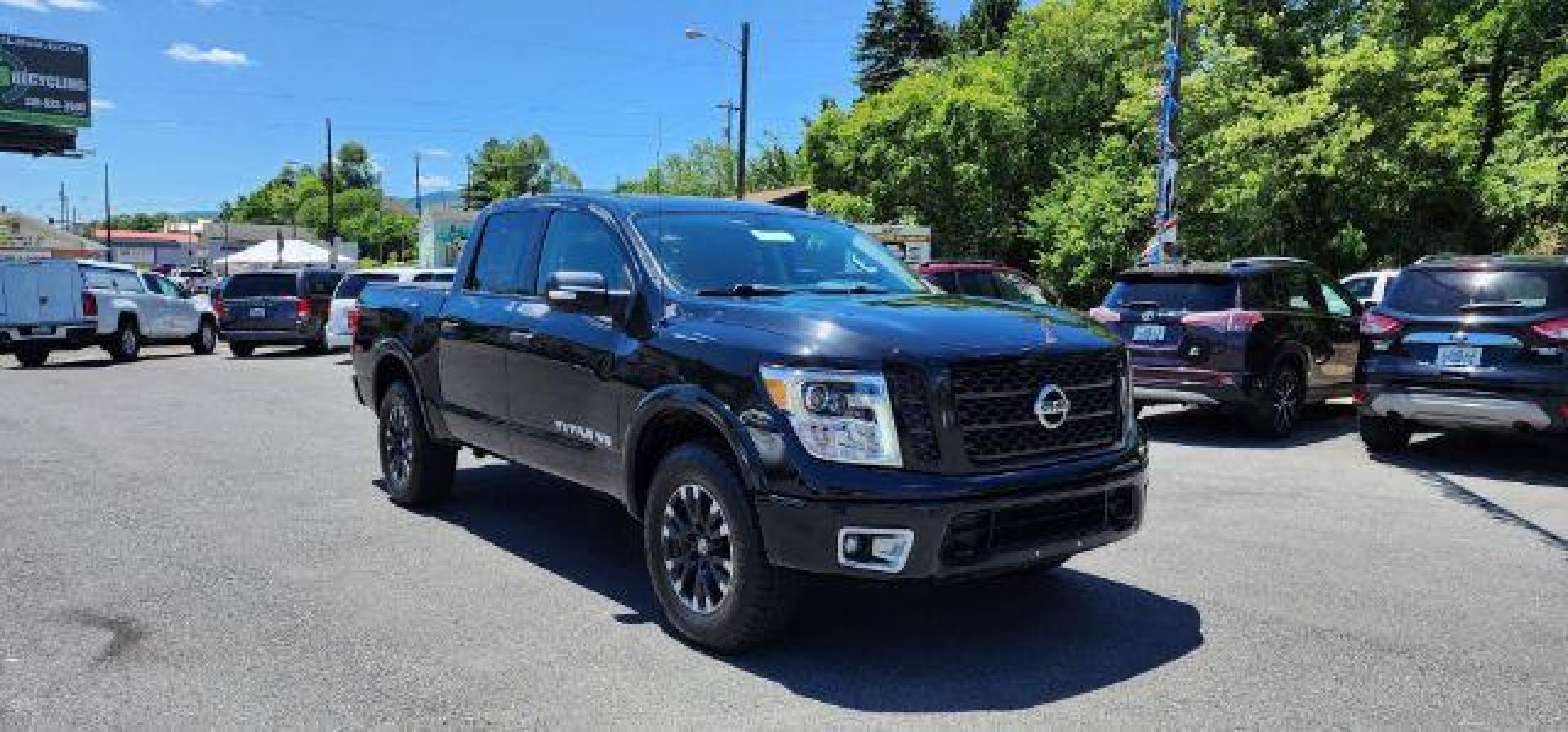 2019 BLACK /Black, cloth Nissan Titan PRO-4X Crew Cab 4WD (1N6AA1E54KN) with an 5.6L V8 engine, AT transmission, located at 353 S. Mineral St., Keyser, WV, 26726, (304) 788-7887, 39.436451, -78.981674 - FOR A BETTER PRICE CALL PAUL AT 301-268-8150 - Photo#0