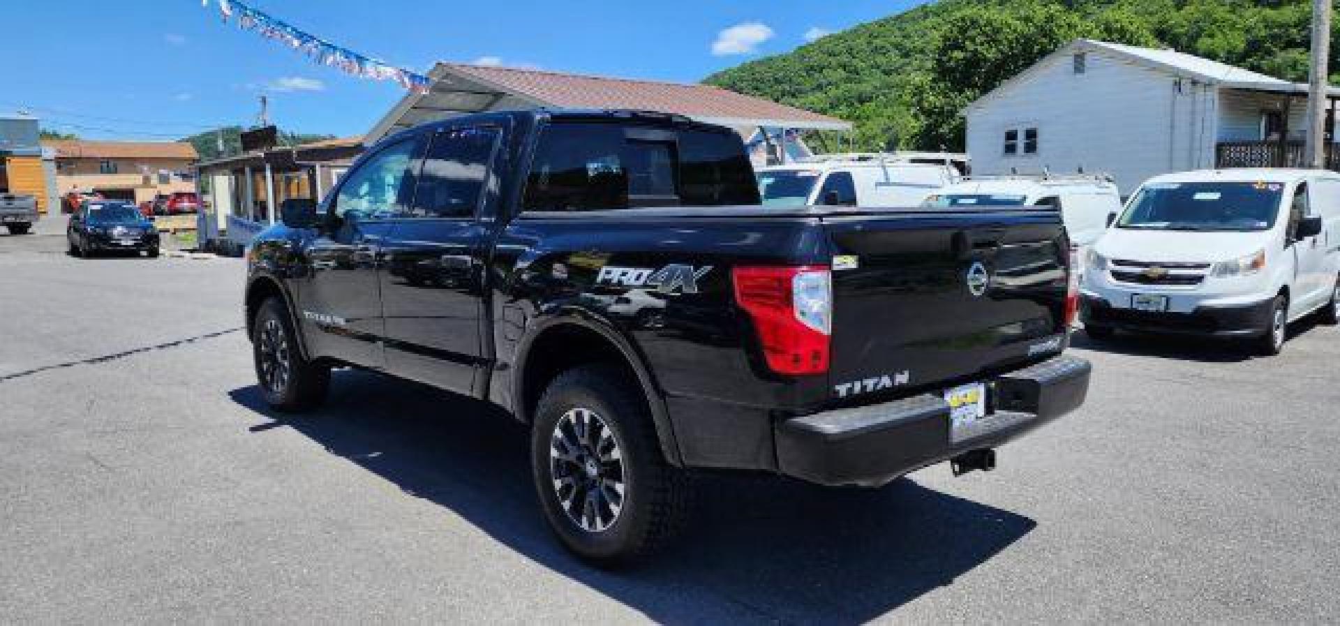 2019 BLACK /Black, cloth Nissan Titan PRO-4X Crew Cab 4WD (1N6AA1E54KN) with an 5.6L V8 engine, AT transmission, located at 353 S. Mineral St., Keyser, WV, 26726, (304) 788-7887, 39.436451, -78.981674 - FOR A BETTER PRICE CALL PAUL AT 301-268-8150 - Photo#9