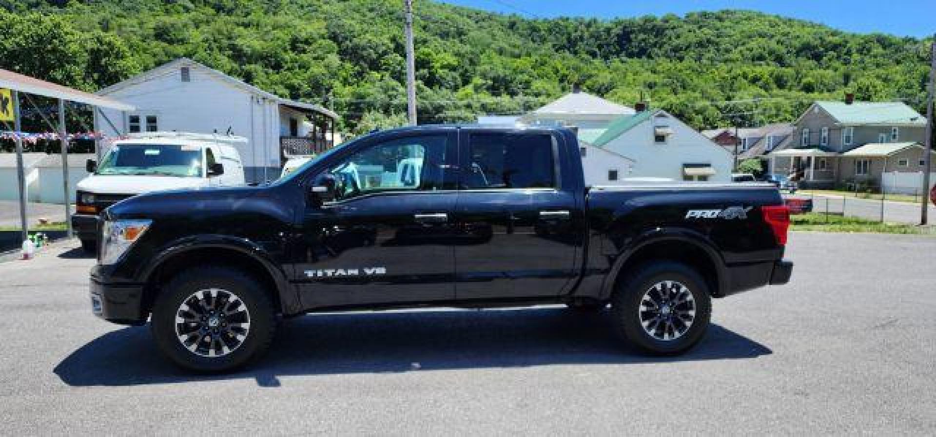 2019 BLACK /Black, cloth Nissan Titan PRO-4X Crew Cab 4WD (1N6AA1E54KN) with an 5.6L V8 engine, AT transmission, located at 353 S. Mineral St., Keyser, WV, 26726, (304) 788-7887, 39.436451, -78.981674 - FOR A BETTER PRICE CALL PAUL AT 301-268-8150 - Photo#3