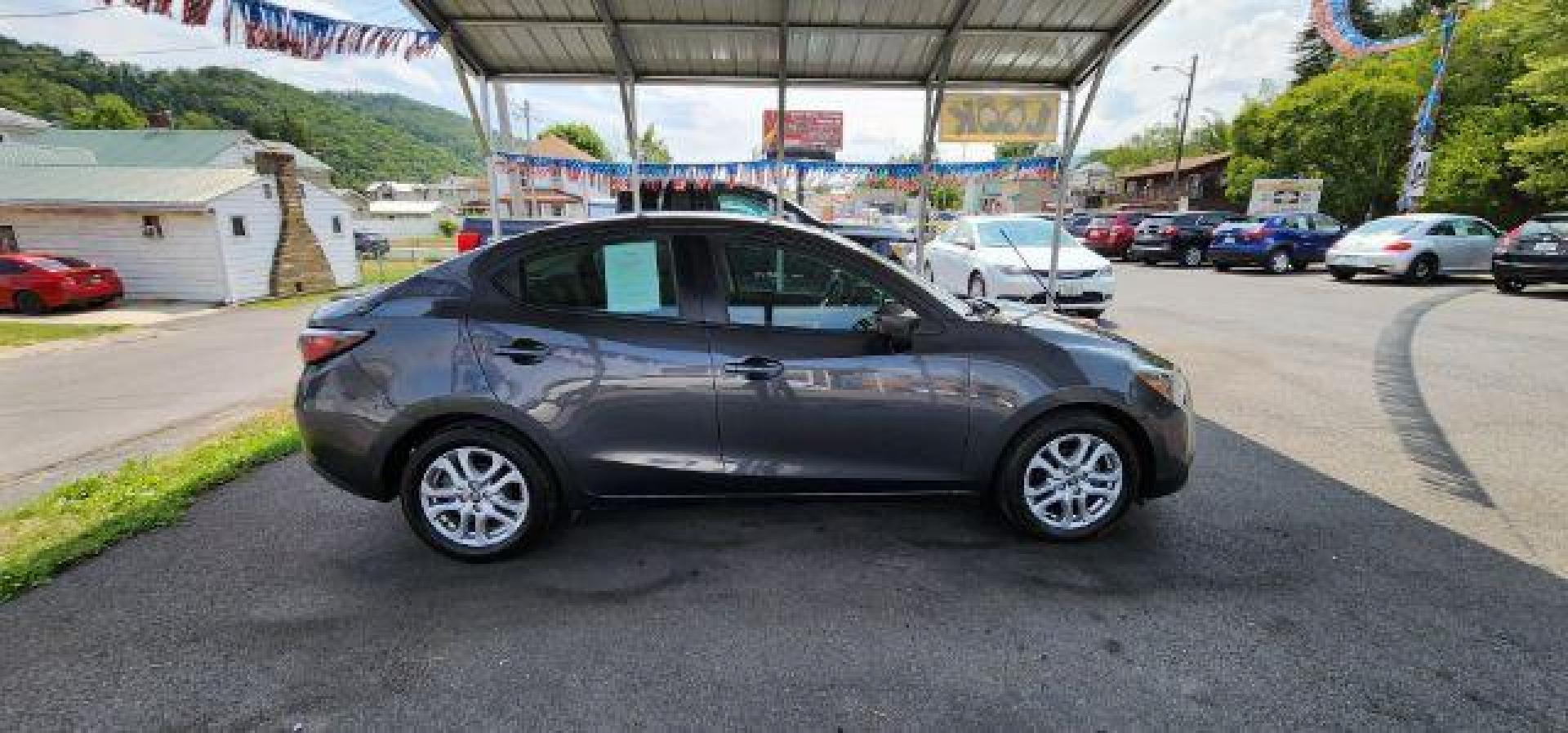 2017 GRAY /Mid-Blue Black, cloth Toyota Yaris iA 6A (3MYDLBYV7HY) with an 1.5L L4 engine, AT transmission, located at 353 S. Mineral St., Keyser, WV, 26726, (304) 788-7887, 39.436451, -78.981674 - Photo#12