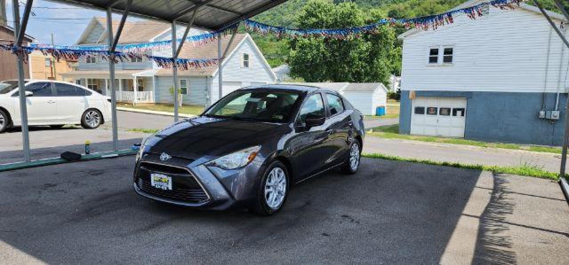 2017 GRAY /Mid-Blue Black, cloth Toyota Yaris iA 6A (3MYDLBYV7HY) with an 1.5L L4 engine, AT transmission, located at 353 S. Mineral St., Keyser, WV, 26726, (304) 788-7887, 39.436451, -78.981674 - Photo#2