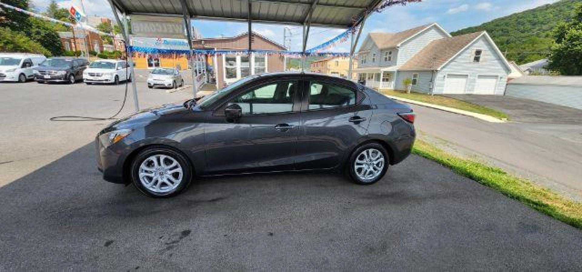 2017 GRAY /Mid-Blue Black, cloth Toyota Yaris iA 6A (3MYDLBYV7HY) with an 1.5L L4 engine, AT transmission, located at 353 S. Mineral St., Keyser, WV, 26726, (304) 788-7887, 39.436451, -78.981674 - Photo#3