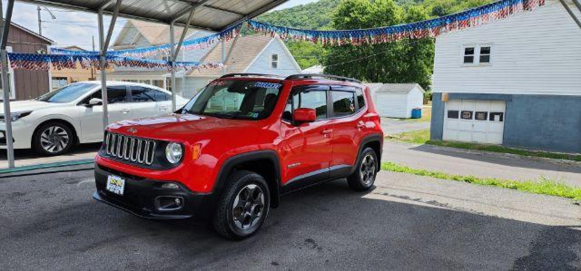 2015 Red /Cloth Jeep Renegade LTTD (ZACCJBBH0FP) with an 1.4L engine, 6 sp transmission, located at 353 S. Mineral St., Keyser, WV, 26726, (304) 788-7887, 39.436451, -78.981674 - FOR A BETTER PRICE CALL PAUL AT 301-268-8150 - Photo#2