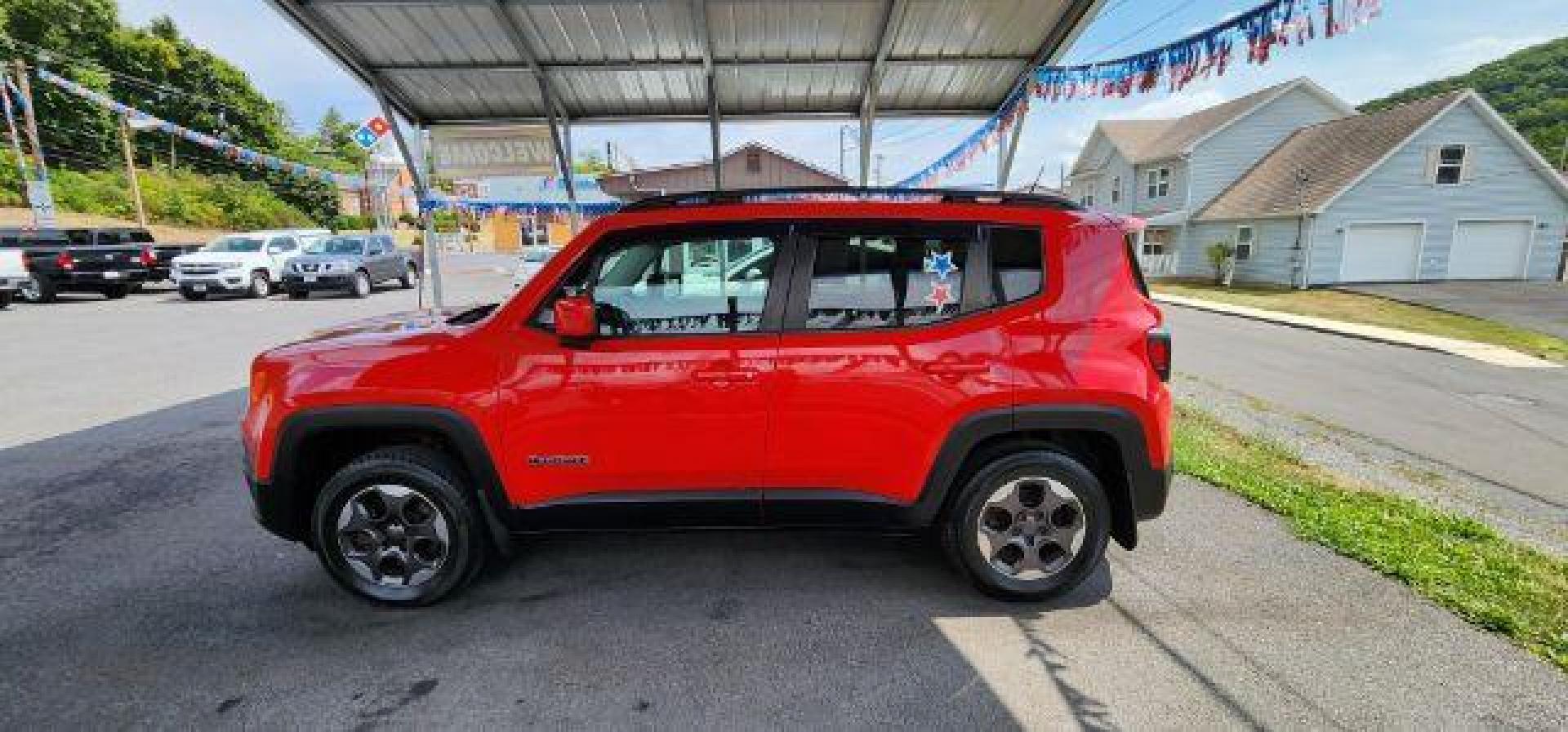 2015 Red /Cloth Jeep Renegade LTTD (ZACCJBBH0FP) with an 1.4L engine, 6 sp transmission, located at 353 S. Mineral St., Keyser, WV, 26726, (304) 788-7887, 39.436451, -78.981674 - FOR A BETTER PRICE CALL PAUL AT 301-268-8150 - Photo#3