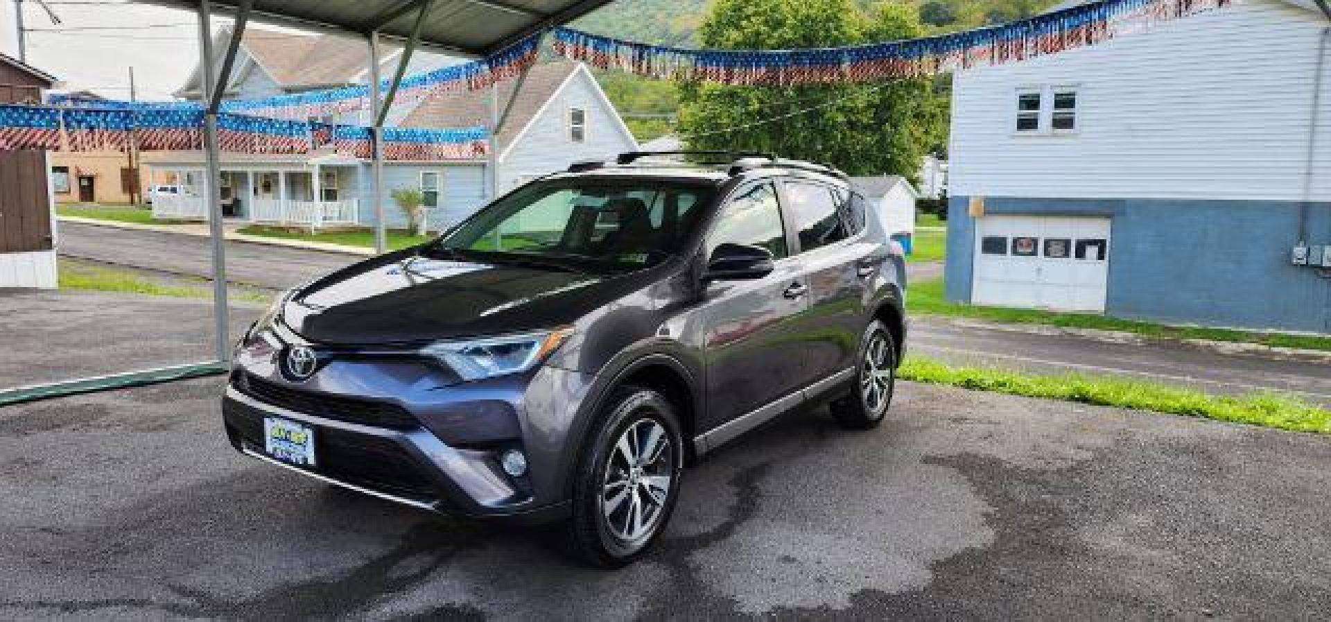 2016 Gray /Black, cloth Toyota RAV4 XLE AWD (JTMRFREV2GJ) with an 2.5L L4 engine, AT transmission, located at 353 S. Mineral St., Keyser, WV, 26726, (304) 788-7887, 39.436451, -78.981674 - FOR A BETTER PRICE CALL PAUL AT 301-268-8150 - Photo#2