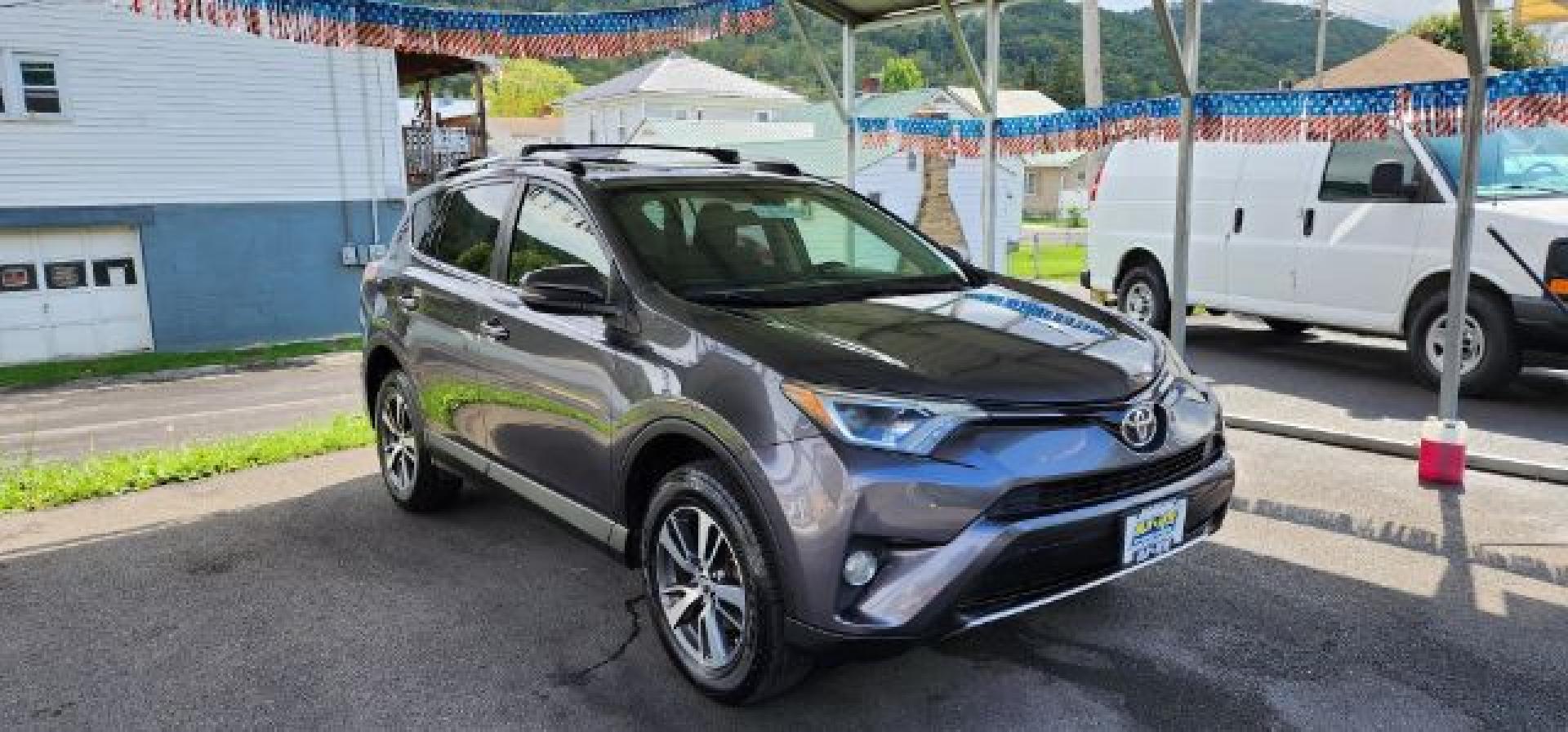 2016 Gray /Black, cloth Toyota RAV4 XLE AWD (JTMRFREV2GJ) with an 2.5L L4 engine, AT transmission, located at 353 S. Mineral St., Keyser, WV, 26726, (304) 788-7887, 39.436451, -78.981674- Photo#0