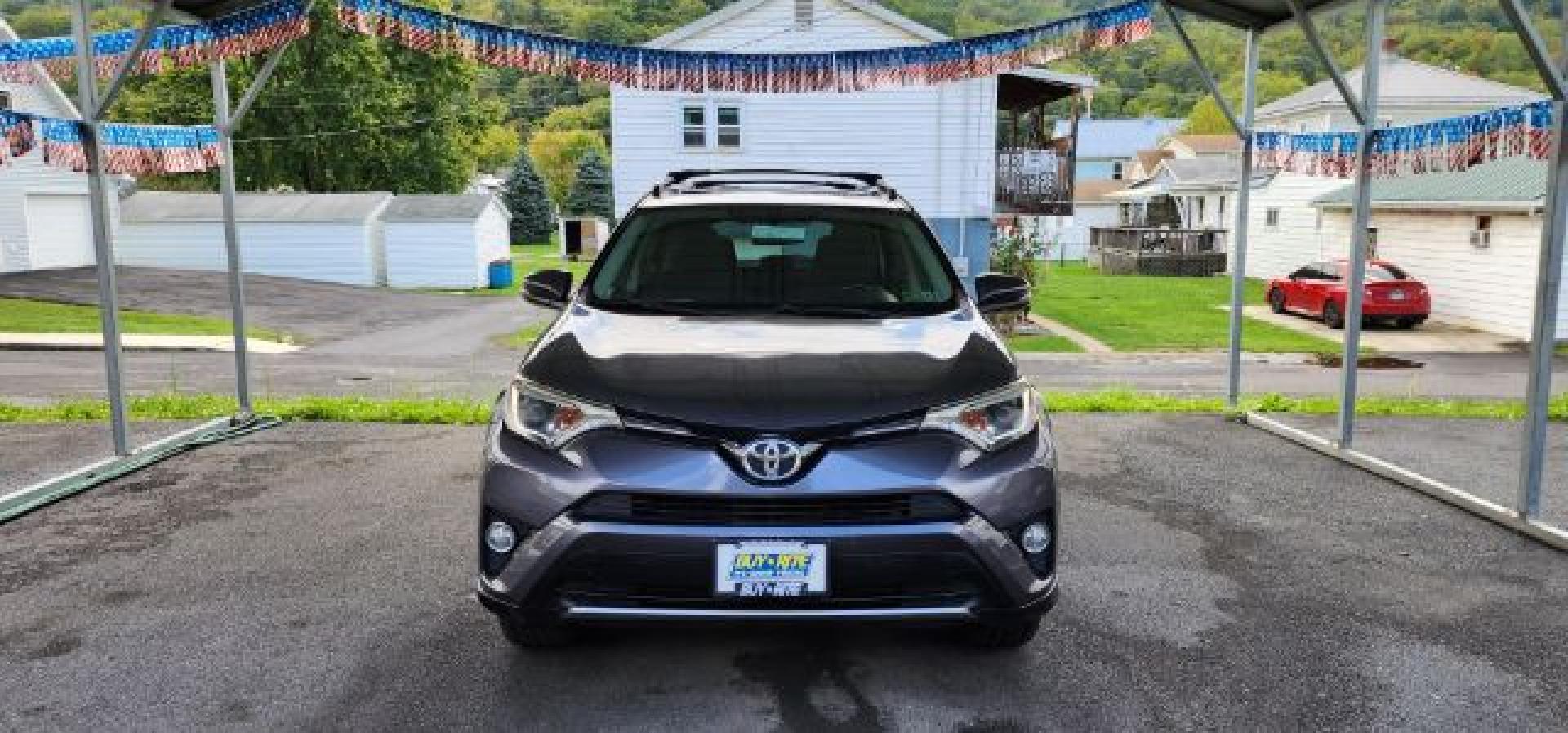2016 Gray /Black, cloth Toyota RAV4 XLE AWD (JTMRFREV2GJ) with an 2.5L L4 engine, AT transmission, located at 353 S. Mineral St., Keyser, WV, 26726, (304) 788-7887, 39.436451, -78.981674- Photo#1