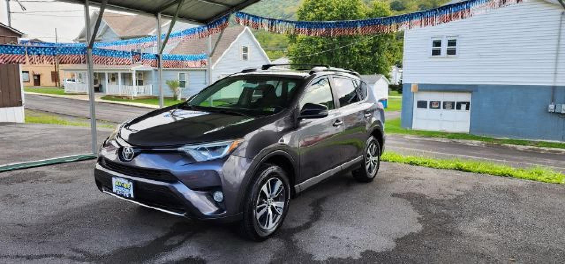 2016 Gray /Black, cloth Toyota RAV4 XLE AWD (JTMRFREV2GJ) with an 2.5L L4 engine, AT transmission, located at 353 S. Mineral St., Keyser, WV, 26726, (304) 788-7887, 39.436451, -78.981674- Photo#2