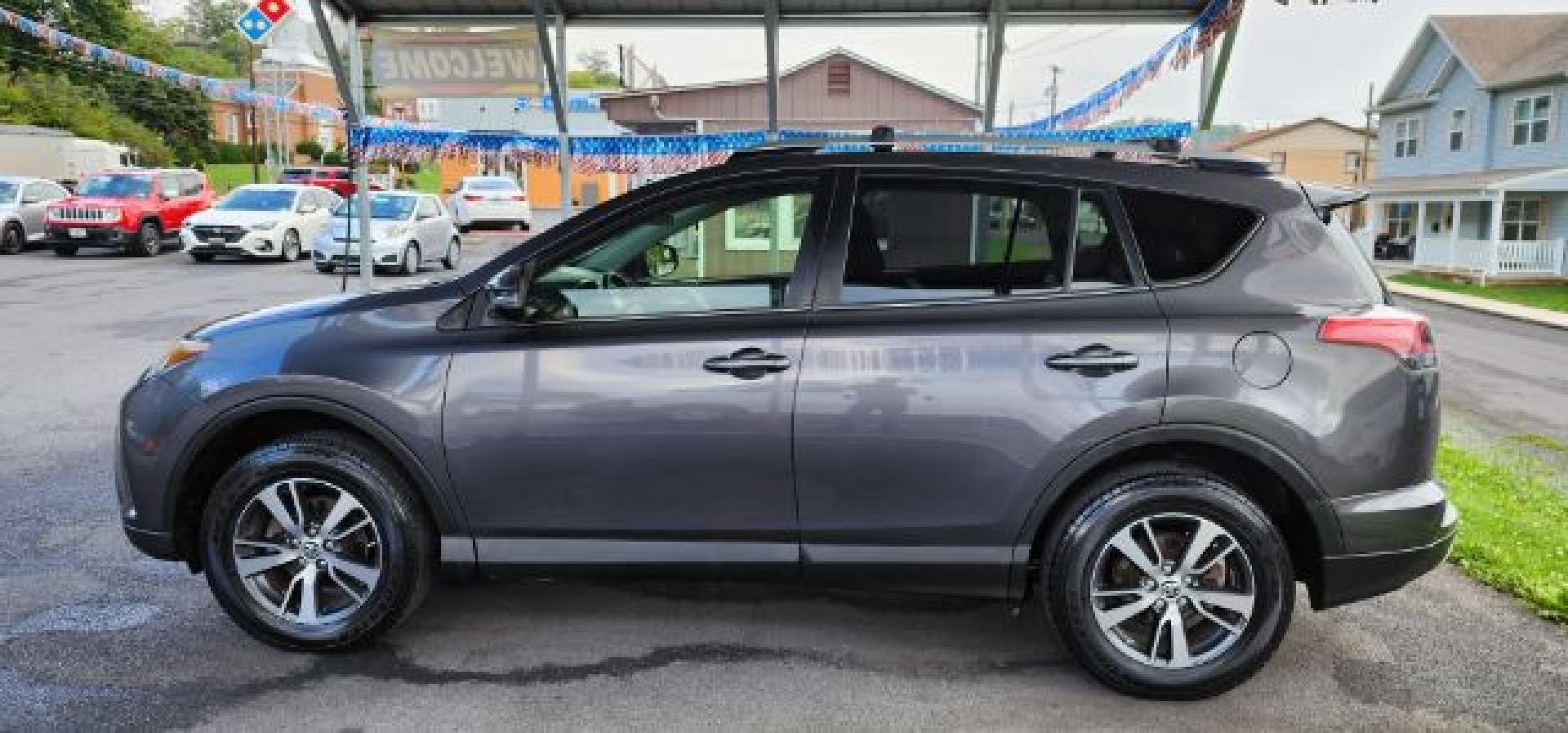2016 Gray /Black, cloth Toyota RAV4 XLE AWD (JTMRFREV2GJ) with an 2.5L L4 engine, AT transmission, located at 353 S. Mineral St., Keyser, WV, 26726, (304) 788-7887, 39.436451, -78.981674- Photo#3