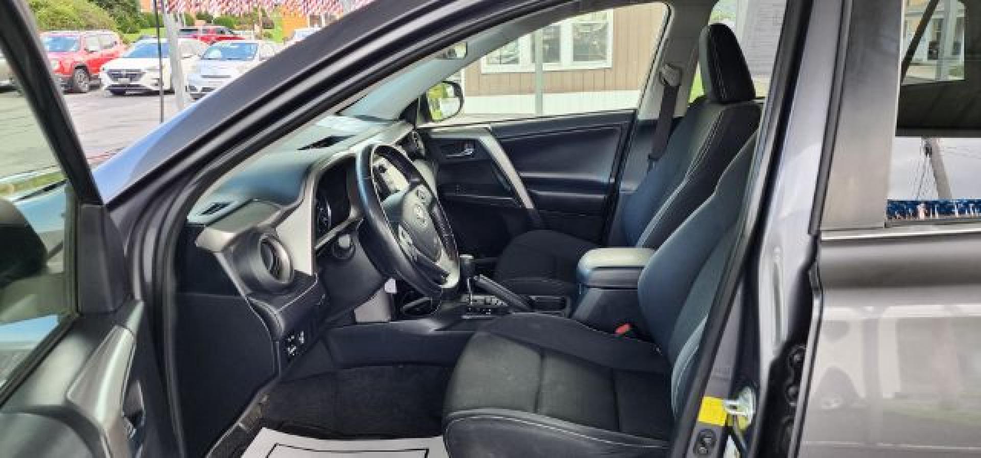 2016 Gray /Black, cloth Toyota RAV4 XLE AWD (JTMRFREV2GJ) with an 2.5L L4 engine, AT transmission, located at 353 S. Mineral St., Keyser, WV, 26726, (304) 788-7887, 39.436451, -78.981674- Photo#4