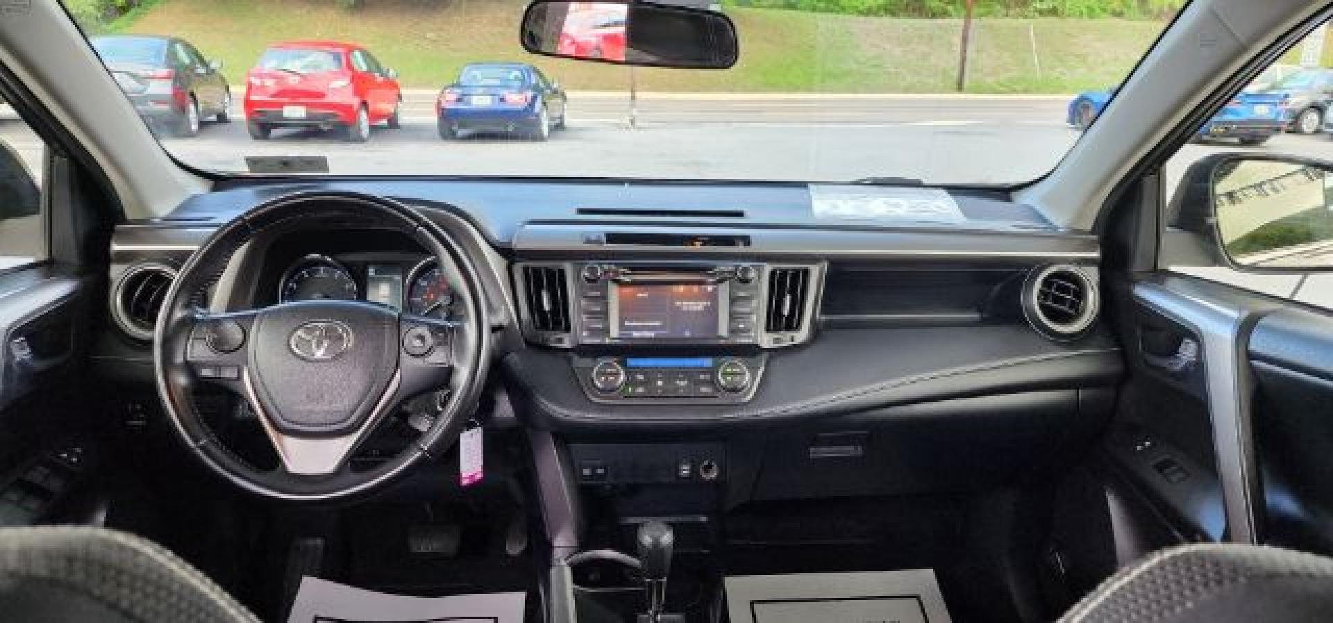 2016 Gray /Black, cloth Toyota RAV4 XLE AWD (JTMRFREV2GJ) with an 2.5L L4 engine, AT transmission, located at 353 S. Mineral St., Keyser, WV, 26726, (304) 788-7887, 39.436451, -78.981674- Photo#5