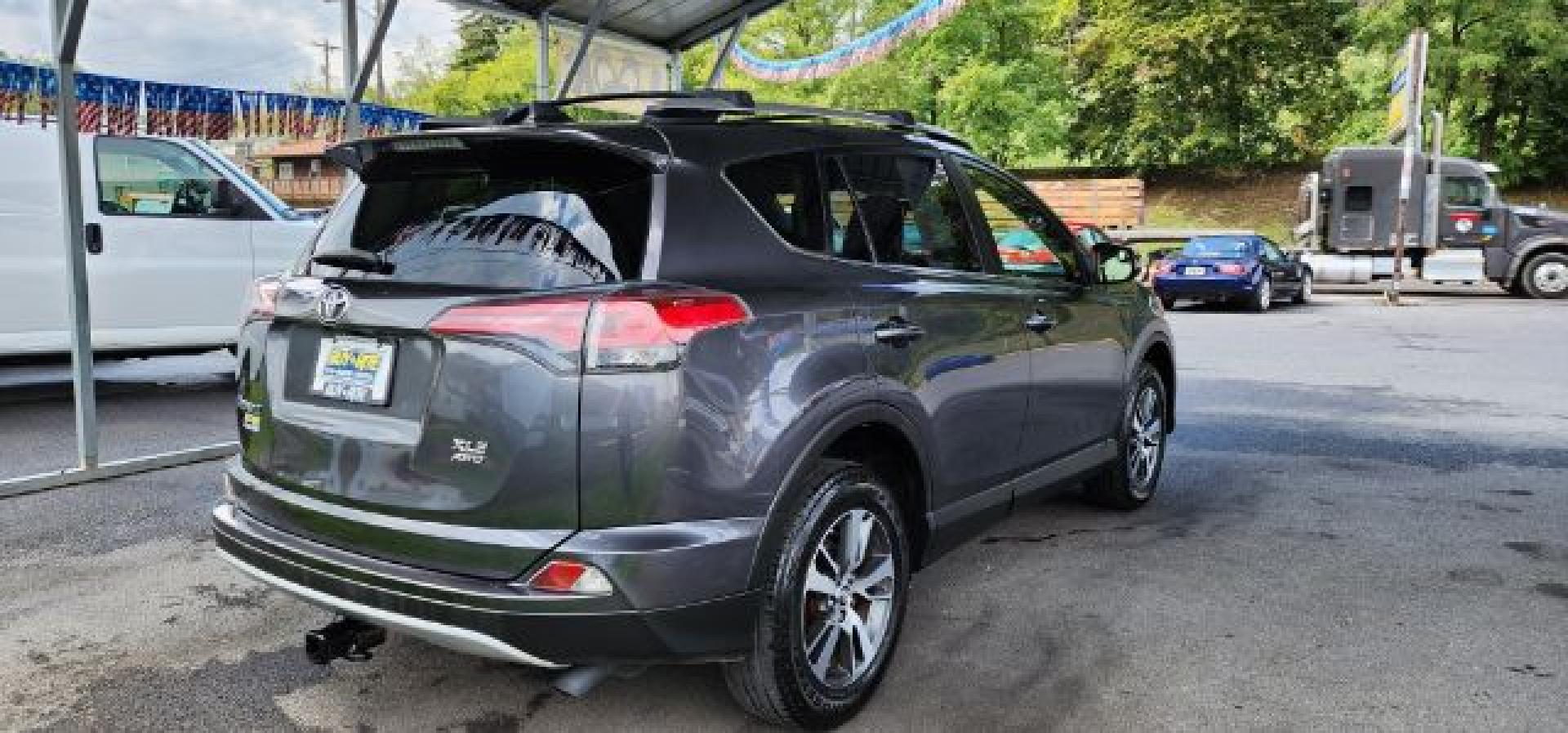 2016 Gray /Black, cloth Toyota RAV4 XLE AWD (JTMRFREV2GJ) with an 2.5L L4 engine, AT transmission, located at 353 S. Mineral St., Keyser, WV, 26726, (304) 788-7887, 39.436451, -78.981674- Photo#11