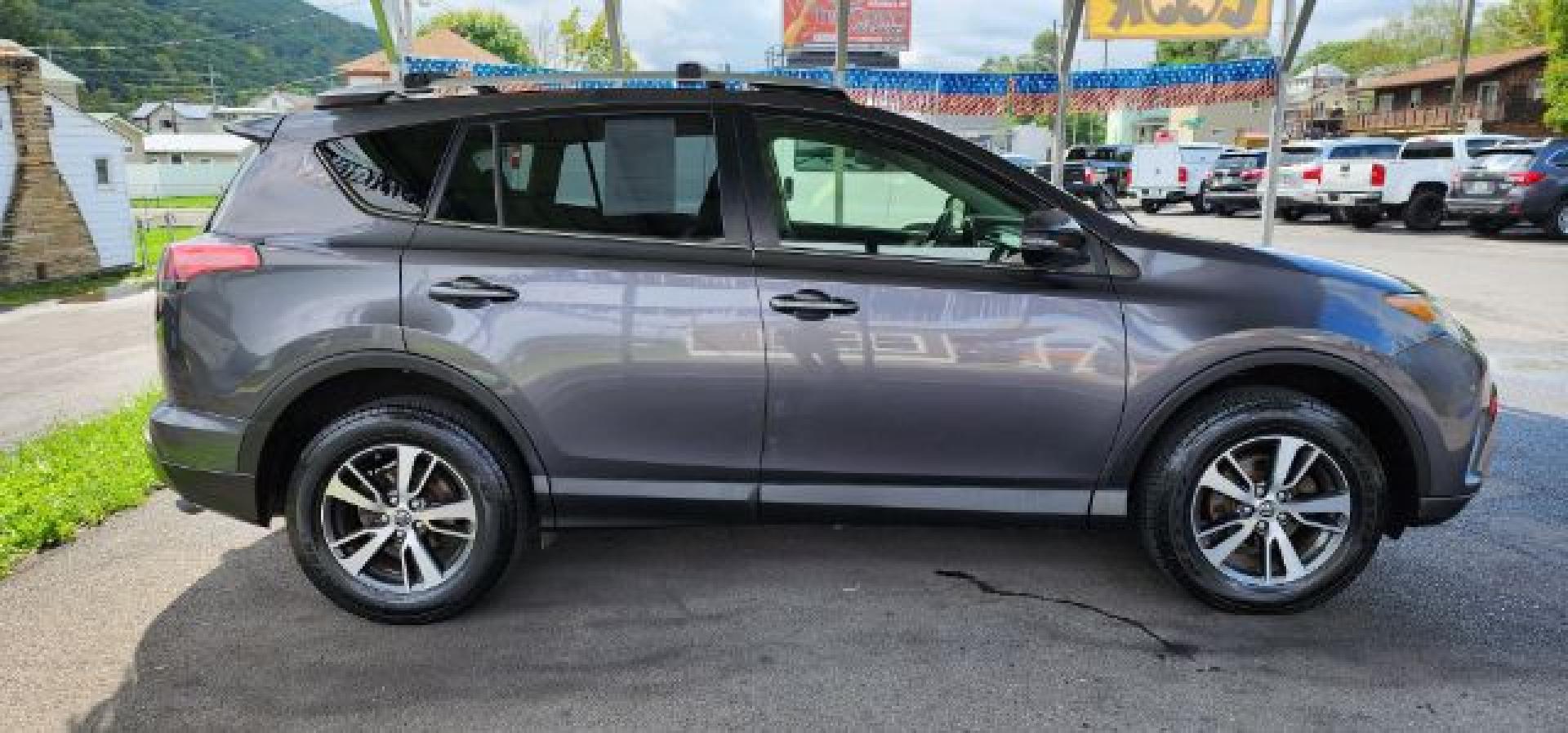 2016 Gray /Black, cloth Toyota RAV4 XLE AWD (JTMRFREV2GJ) with an 2.5L L4 engine, AT transmission, located at 353 S. Mineral St., Keyser, WV, 26726, (304) 788-7887, 39.436451, -78.981674- Photo#12