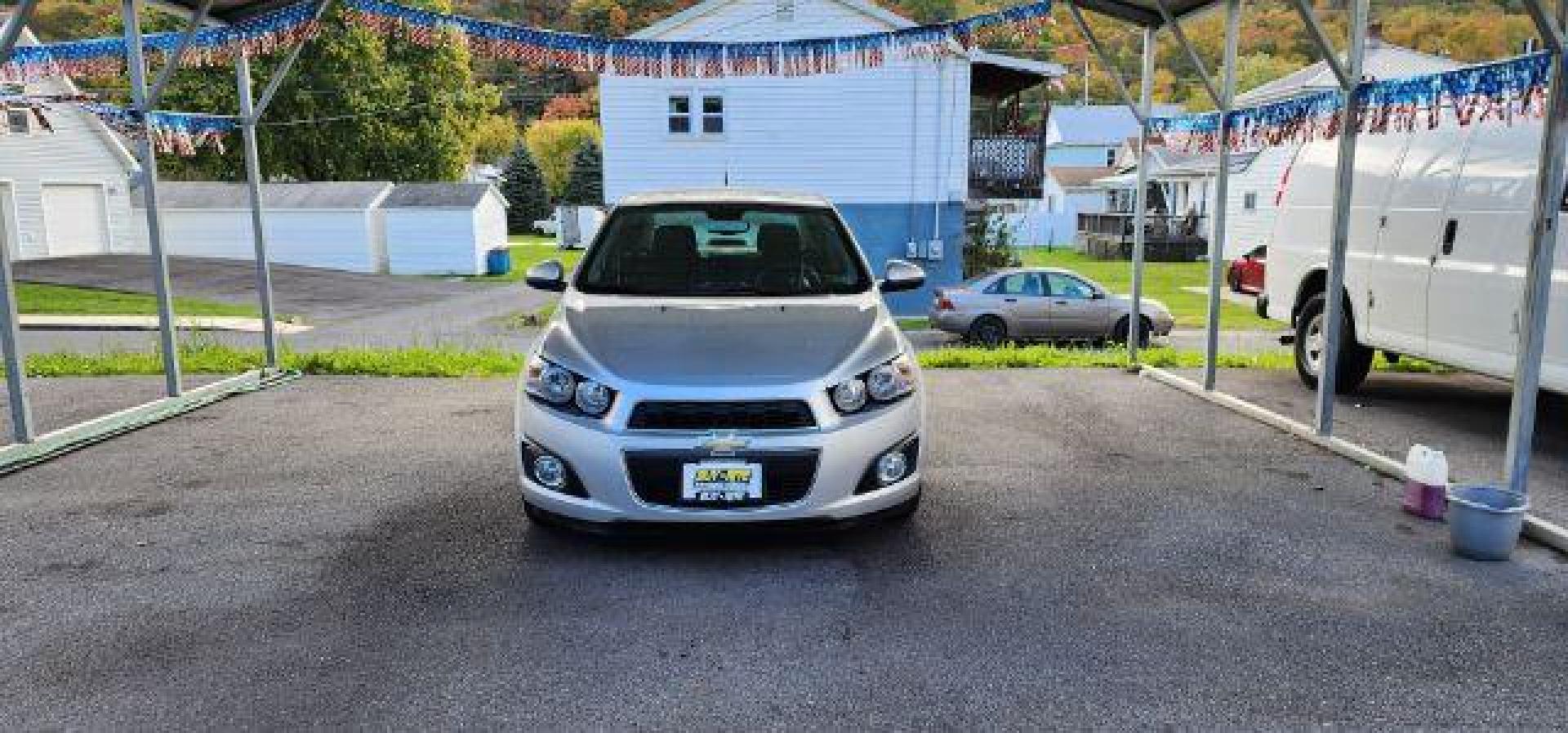 2012 SILVER /Jet Blk/ Brick Cloth Interior Chevrolet Sonic LT Sedan (1G1JC5SH4C4) with an 1.8L L4 engine, AT transmission, located at 353 S. Mineral St., Keyser, WV, 26726, (304) 788-7887, 39.436451, -78.981674 - FOR A BETTER PRICE CALL PAUL AT 301-268-8150 - Photo#1