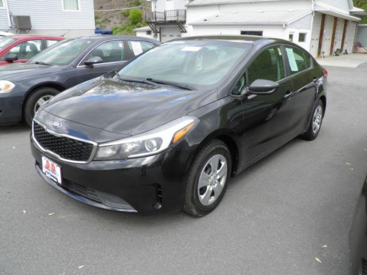 2017 BLACK /Black, cloth KIA FORTE LX 6A (3KPFK4A79HE) with an 2.0l L4 engine, AT transmission, located at 353 S. Mineral St., Keyser, WV, 26726, (304) 788-7887, 39.436451, -78.981674 - Photo#0